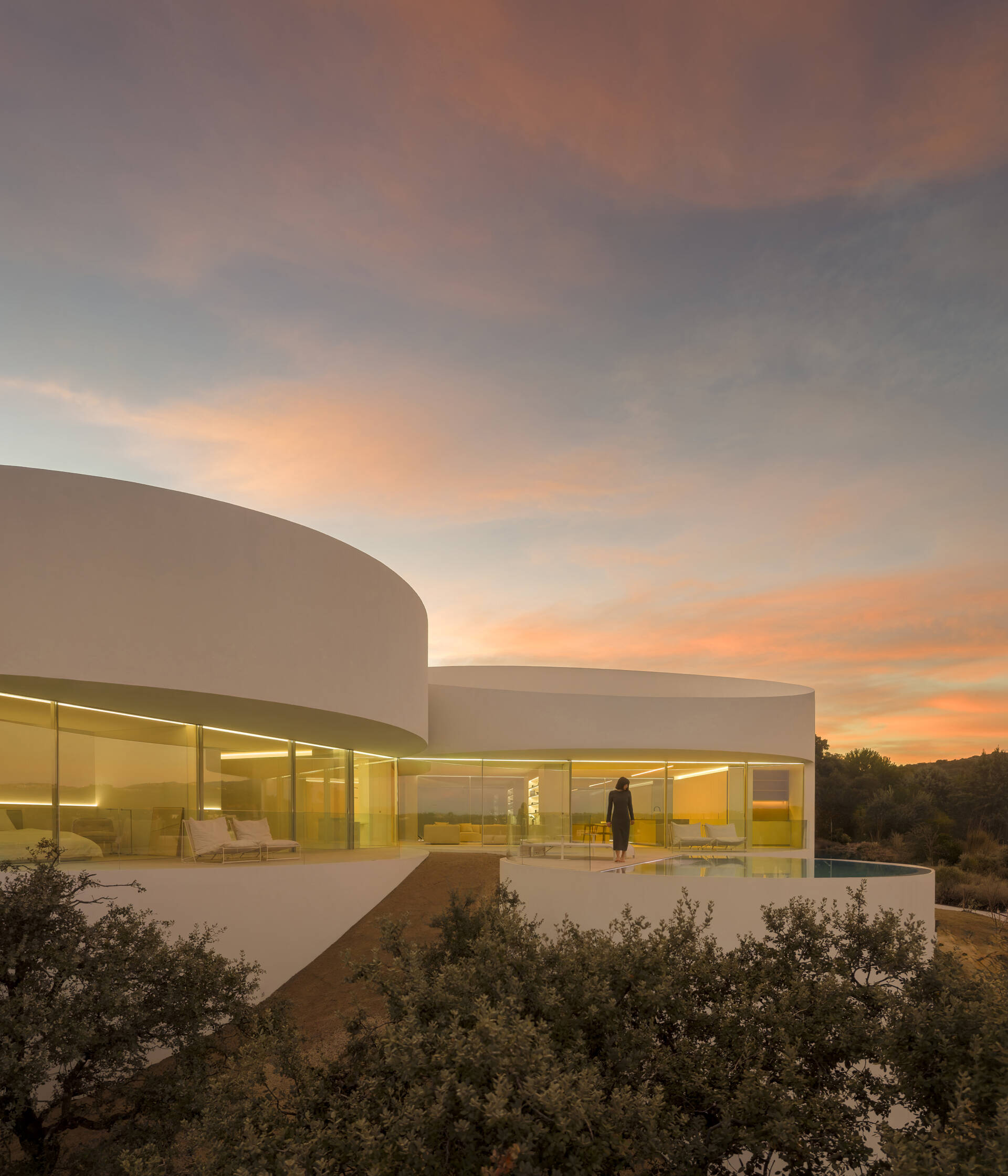 Explore how five curved volumes and an unusual floor plan combine to create one of Madrid's most distinctive contemporary homes.
