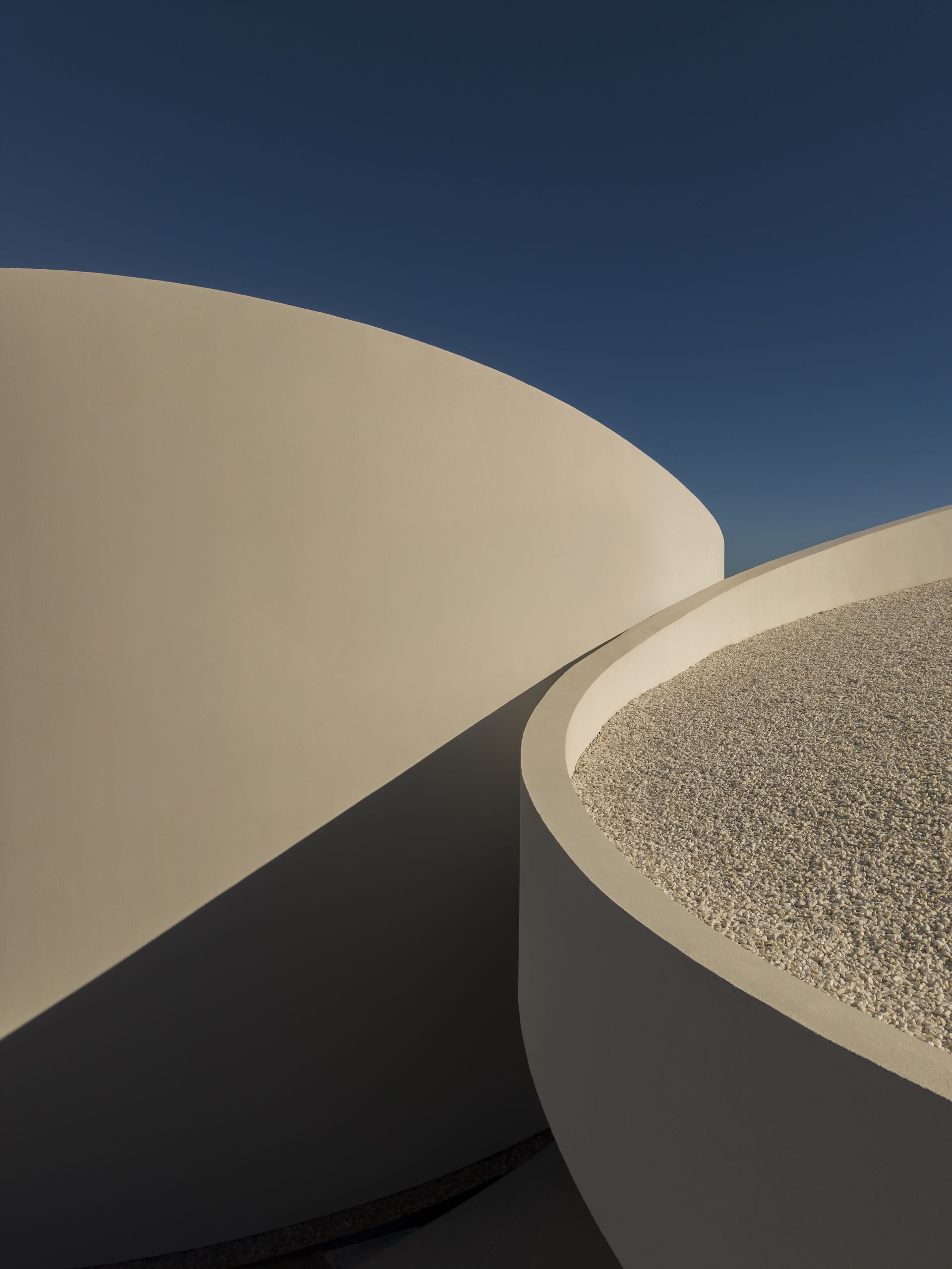 Explore how five curved volumes and an unusual floor plan combine to create one of Madrid's most distinctive contemporary homes.