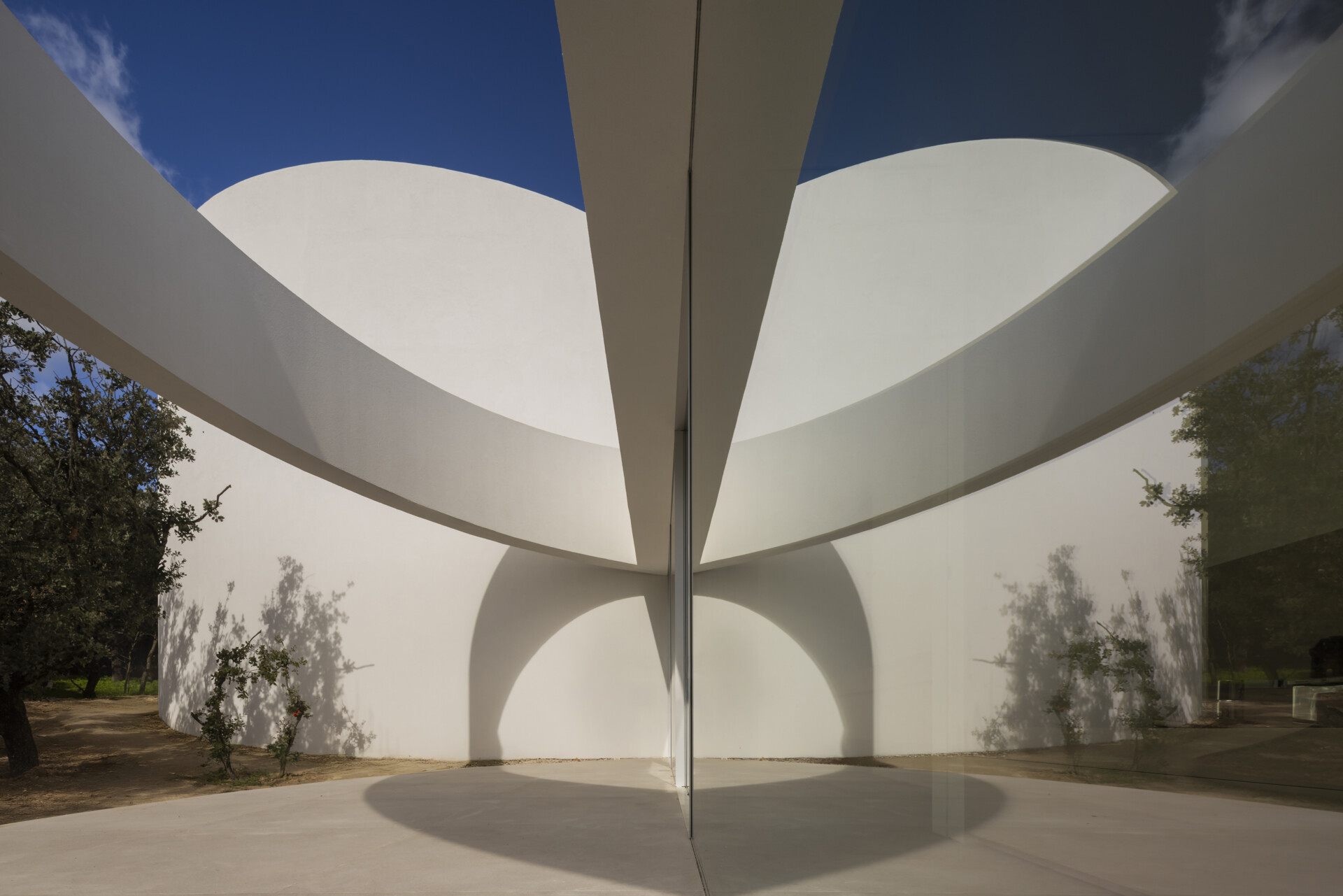 Explore how five curved volumes and an unusual floor plan combine to create one of Madrid's most distinctive contemporary homes.