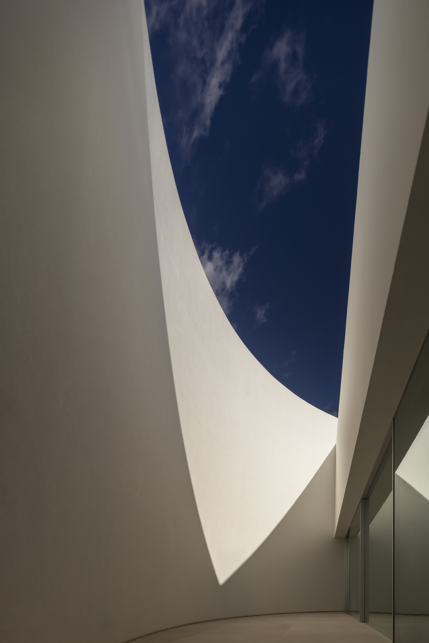 Explore how five curved volumes and an unusual floor plan combine to create one of Madrid's most distinctive contemporary homes.
