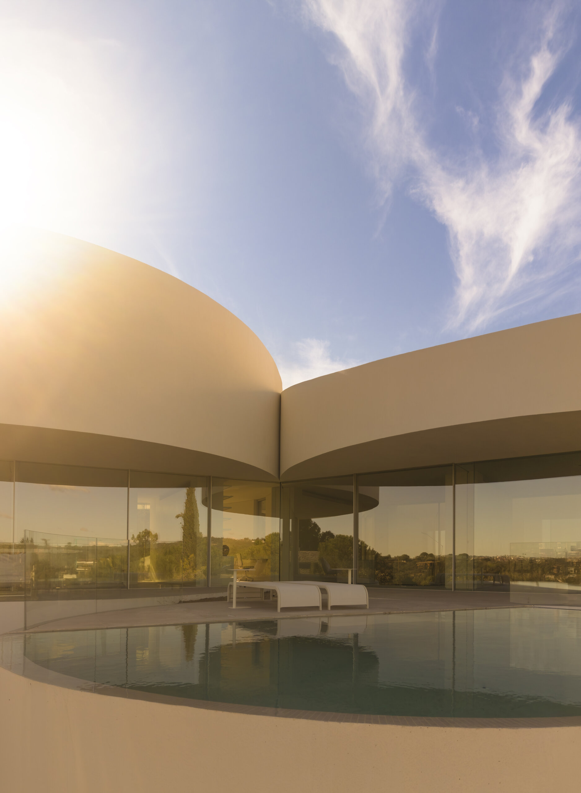 Explore how five curved volumes and an unusual floor plan combine to create one of Madrid's most distinctive contemporary homes.