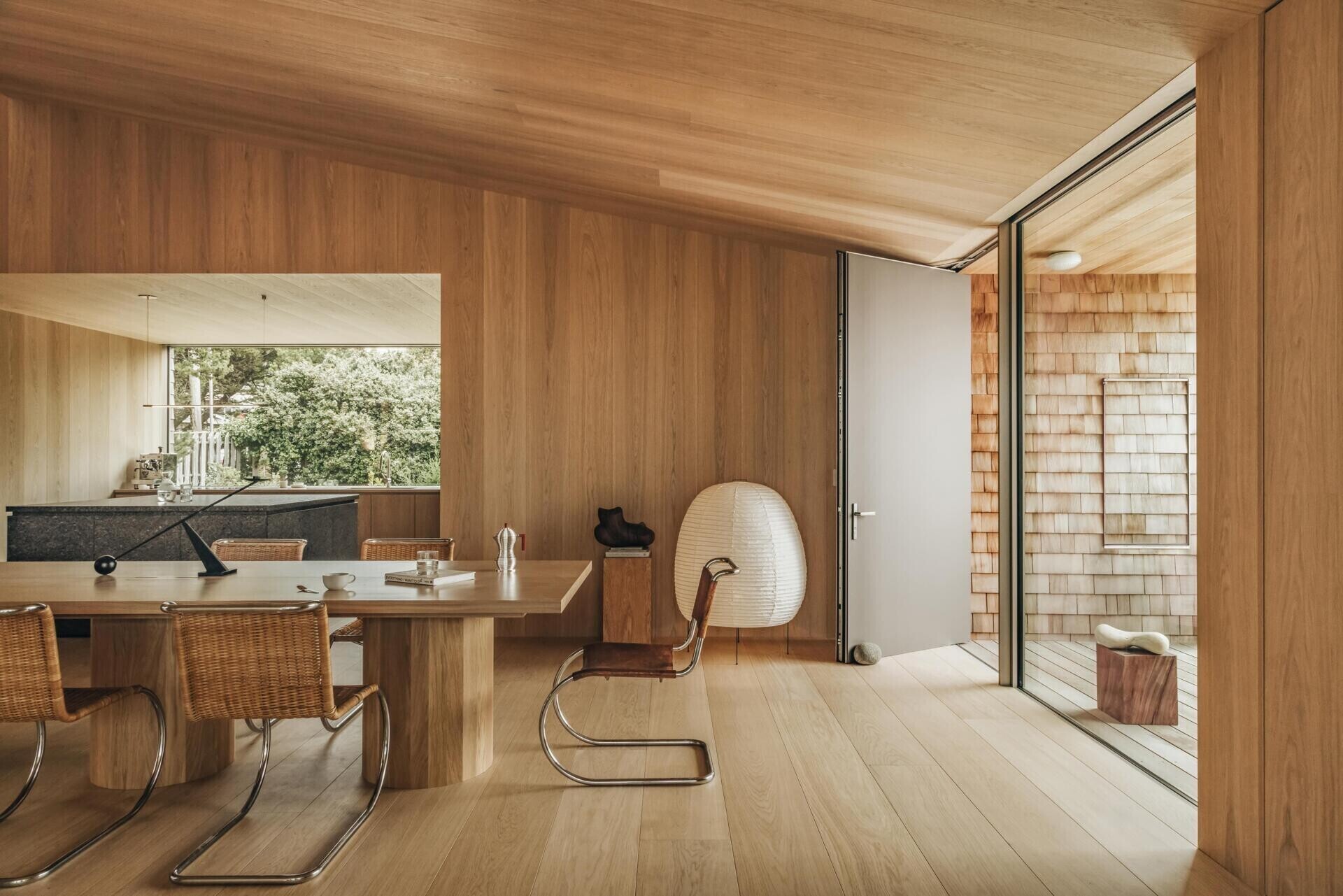 Dune House by Waechter Architecture pairs weathered cedar with warm oak interiors on the North Oregon Coast. See how simple materials, panoramic windows, and minimalist design create a timeless beach home.