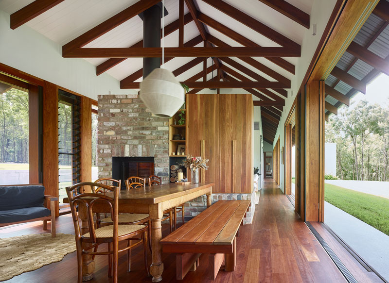 Louver windows and sliding doors help this Brisbane family home stay naturally cool while filling every room with fresh air and light.