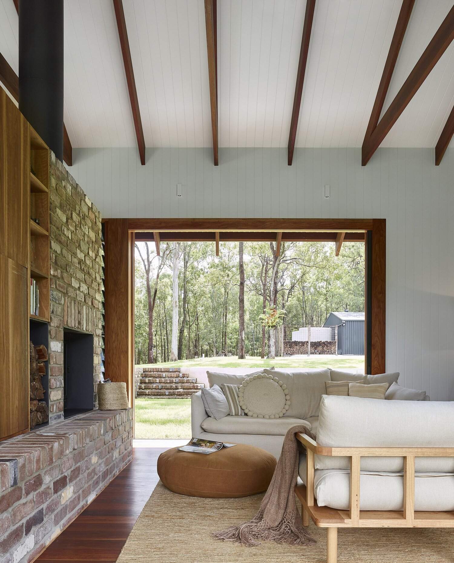 Louver windows and sliding doors help this Brisbane family home stay naturally cool while filling every room with fresh air and light.