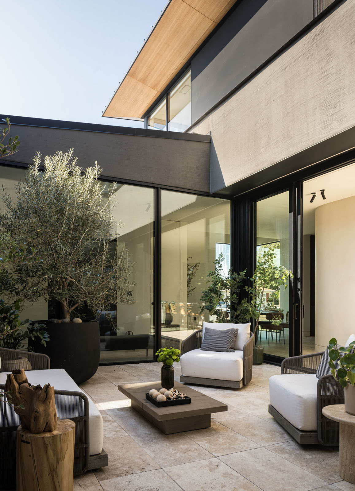 See how Mahya Salehi Studio used a central courtyard and butterfly roof to make this compact Silicon Valley home feel open, bright, and inviting.