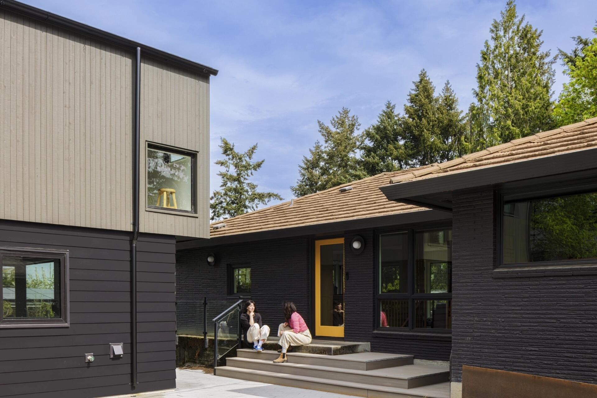 This Seattle garage replacement pairs smart planning with soaring interiors, lake views, and a roof designed with future solar panels in mind.