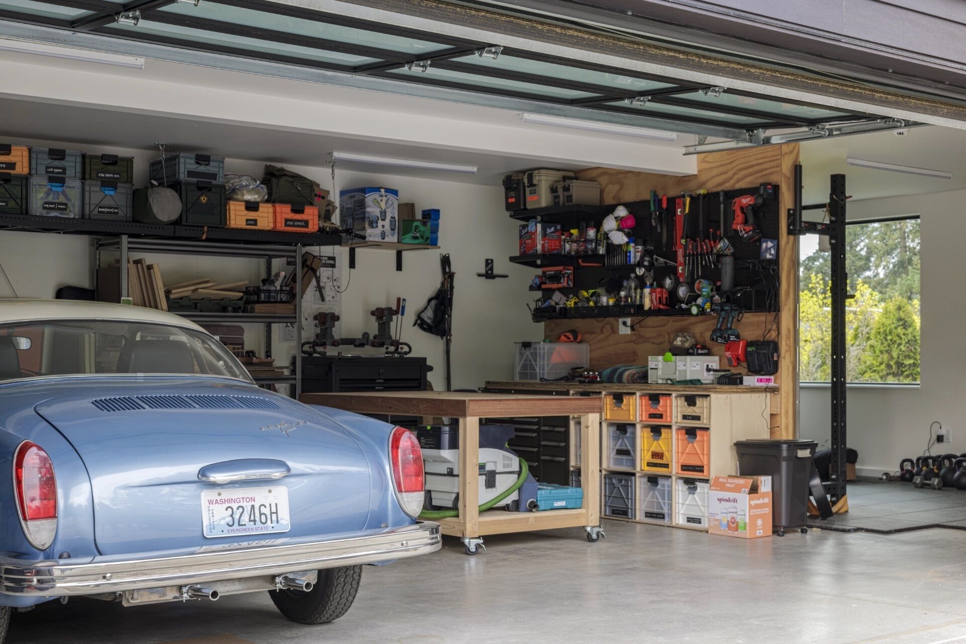 This garage proves utility spaces can do much more than store cars, adding room for fitness without sacrificing functionality.
