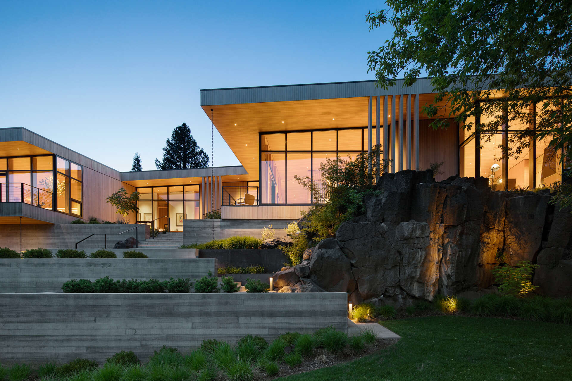 Intro
Discover Riverfold House by Hacker Architects in Central Oregon, where sculptural architecture, natural materials and riverside views come together to create an unforgettable modern family home.