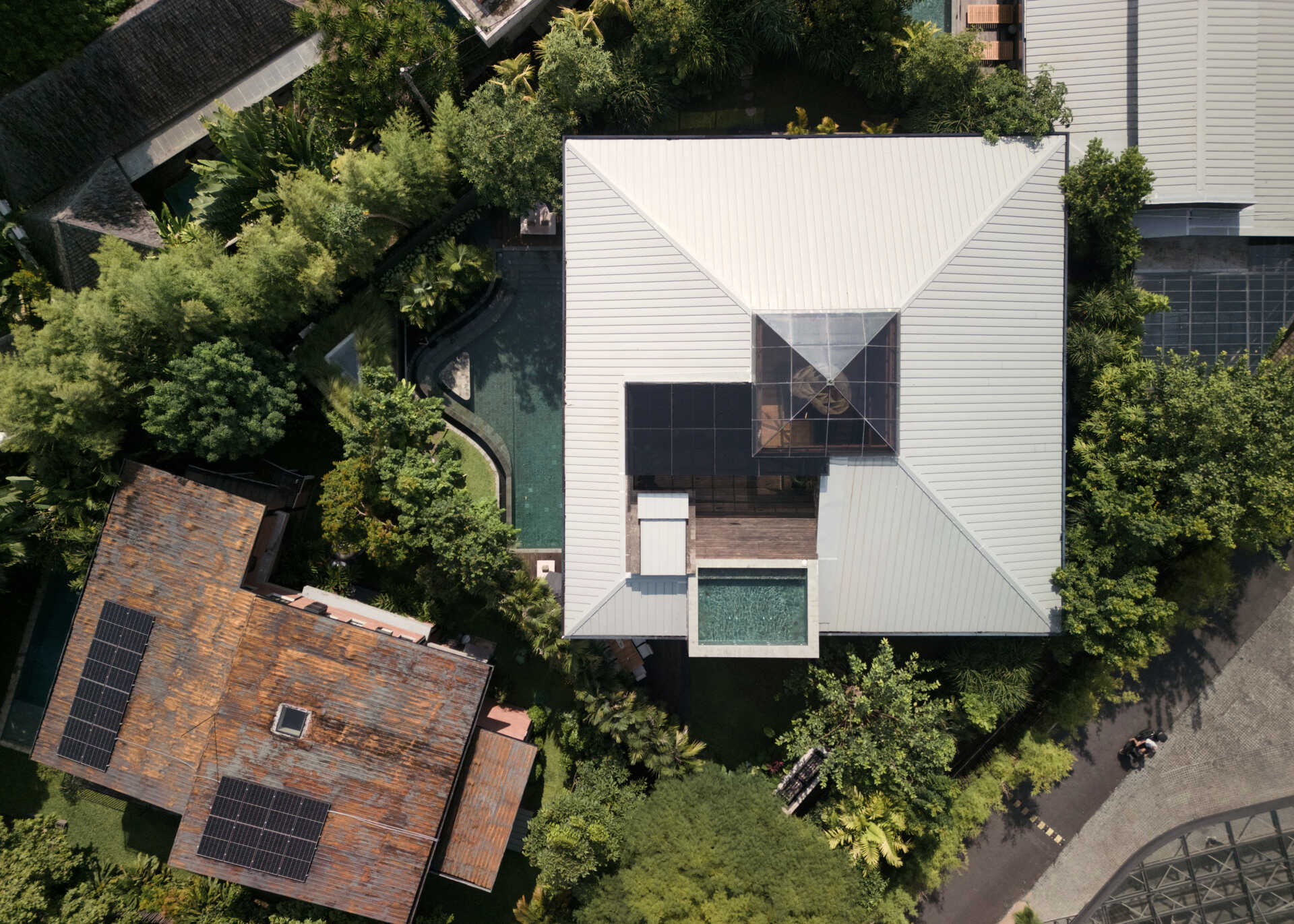 Villa Suki by Alexis Dornier in Bali transforms a simple square into a beautiful tropical home filled with gardens, light and modern interiors.