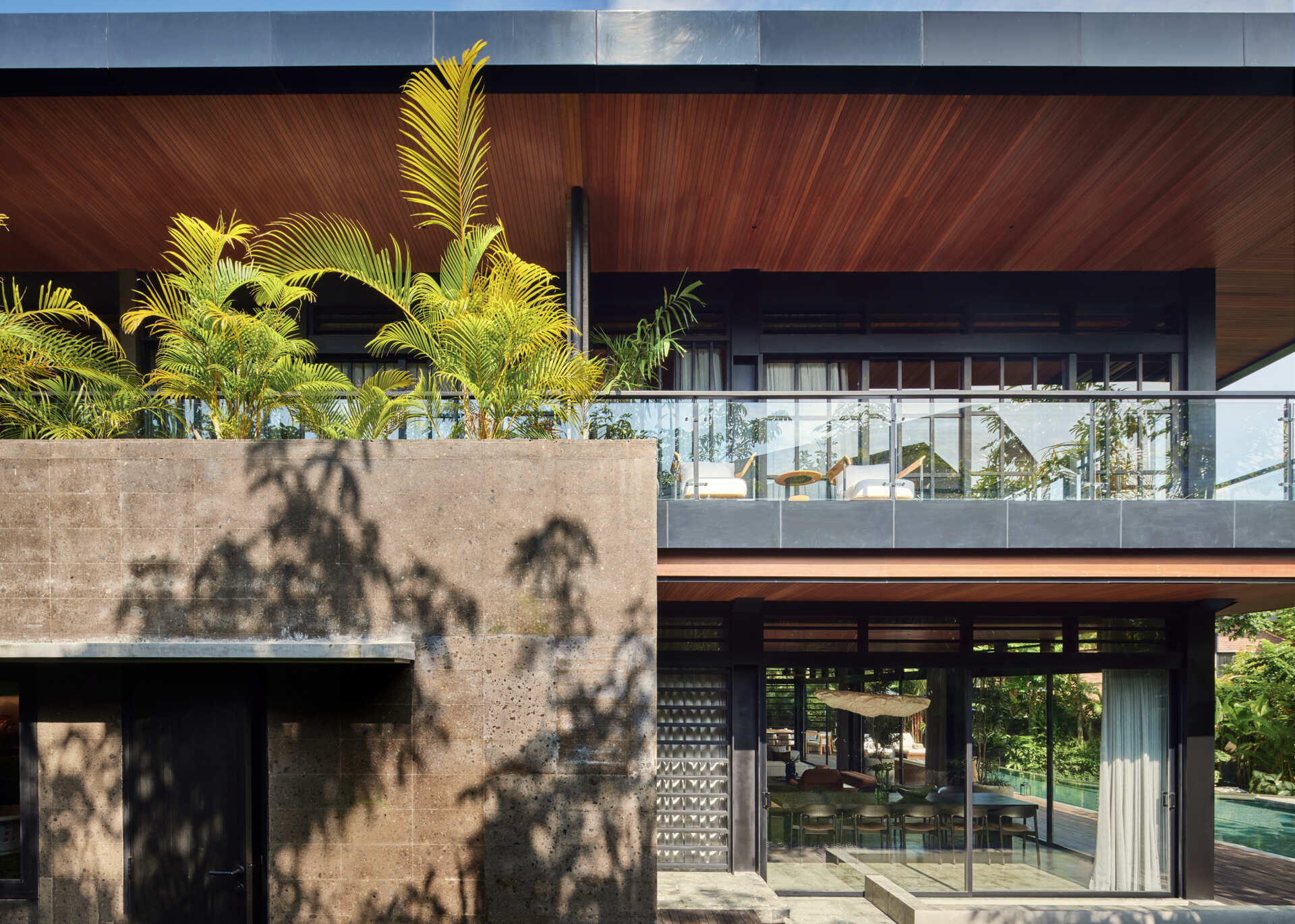 Villa Suki by Alexis Dornier in Bali transforms a simple square into a beautiful tropical home filled with gardens, light and modern interiors.