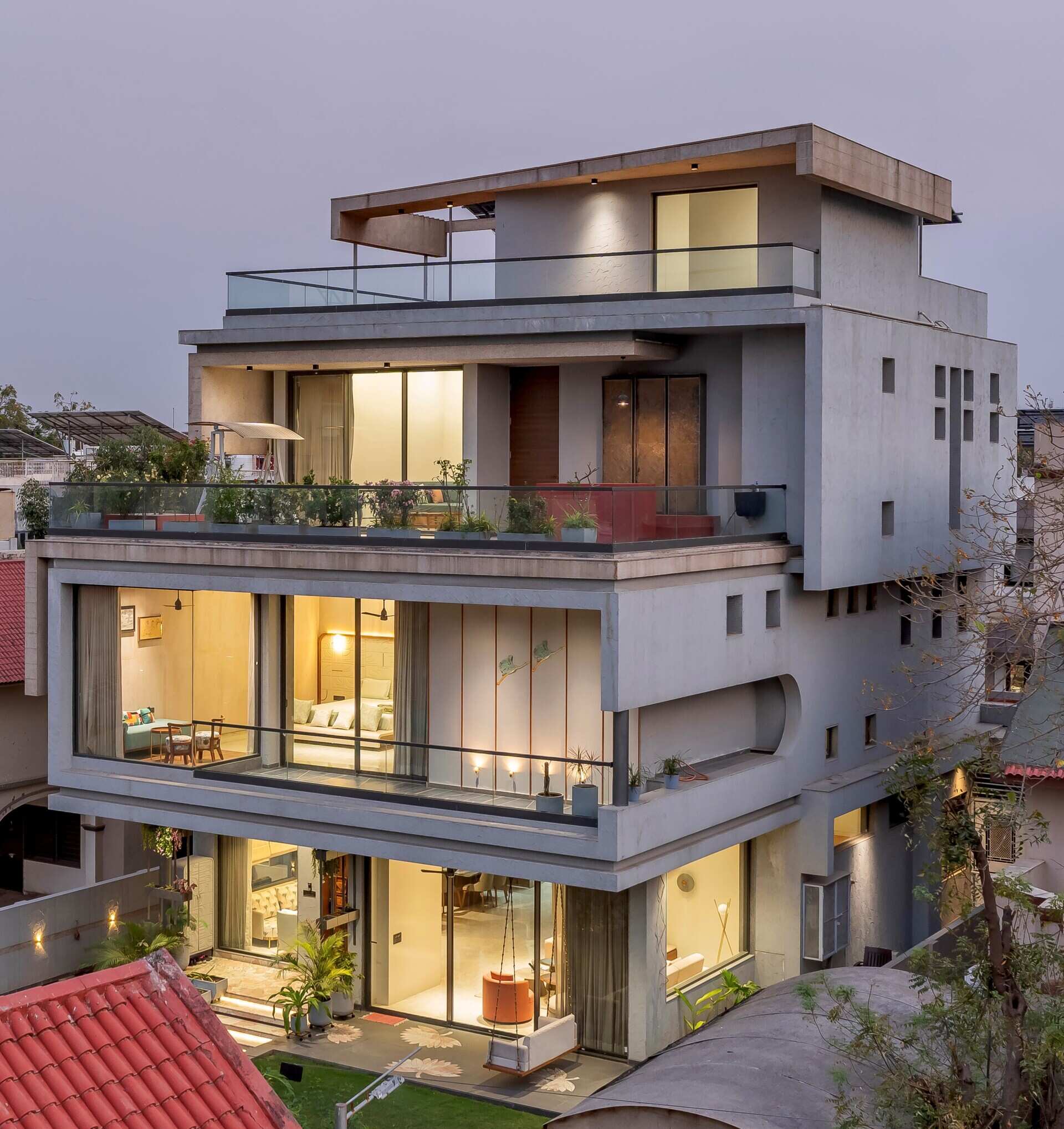 See how this Ahmedabad home's architecture uses orientation, natural light and layered facades to create a comfortable and visually interesting exterior.