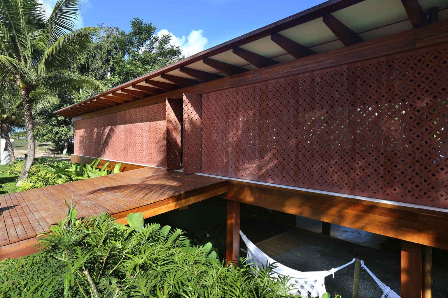 Inside A Brazilian Beach Home Wrapped In A Modern Lattice Screen