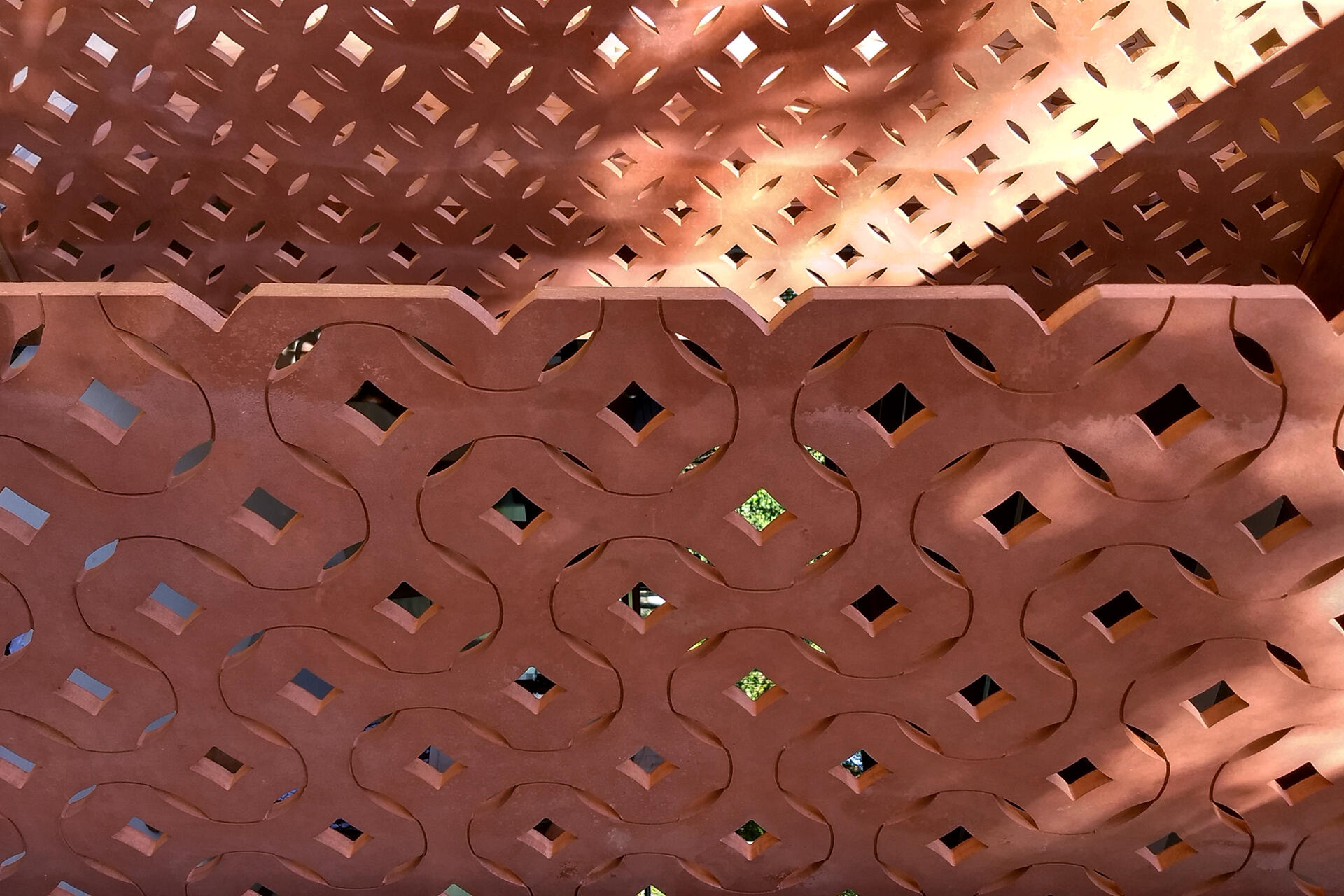 The geometric muxarabi façade transforms a traditional Brazilian lattice into a modern architectural feature that filters sunlight, airflow and privacy.
