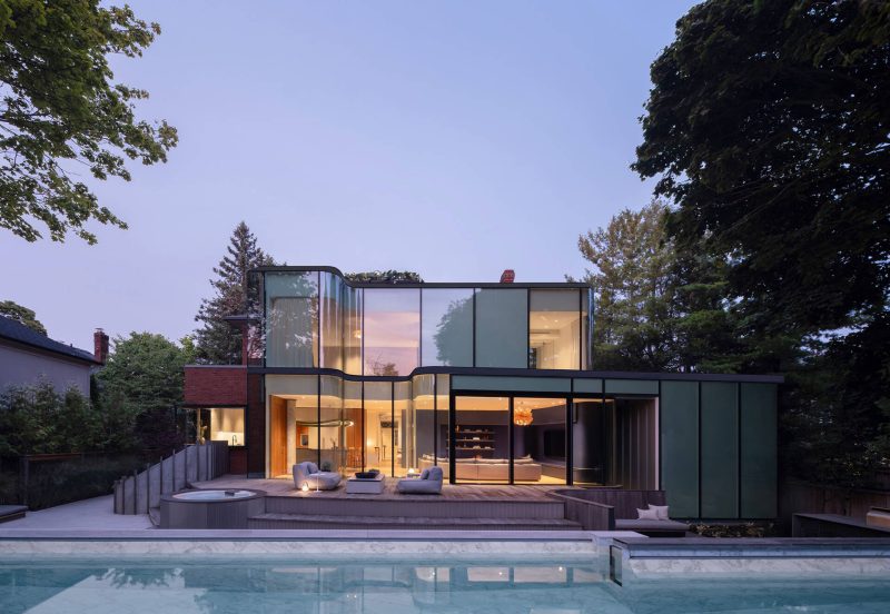 The Toronto Renovation That Pairs Brick Heritage With Curved Glass Architecture