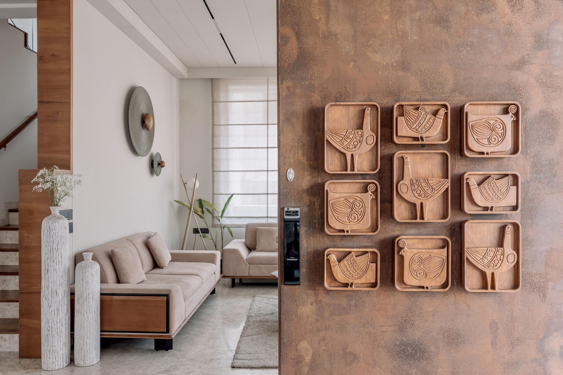 A rotating TV hidden inside a Corian divider makes these two living spaces surprisingly flexible for family life and entertaining.