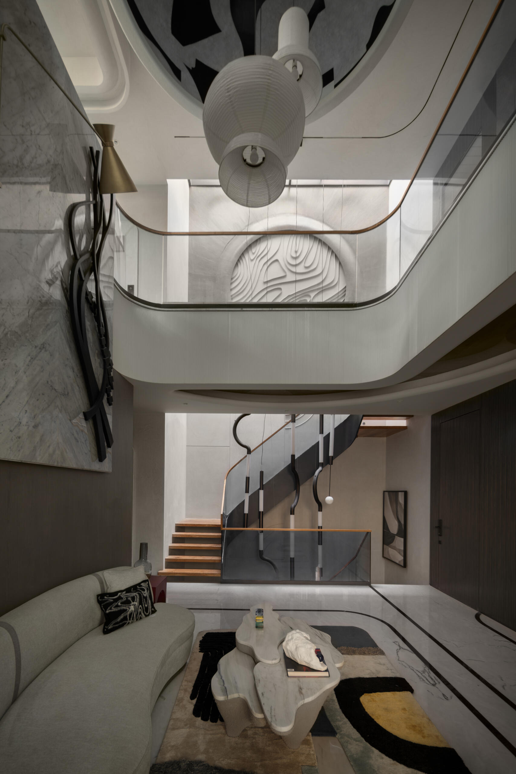 Explore bright double-height living spaces filled with custom furniture, natural light and beautifully crafted interiors.