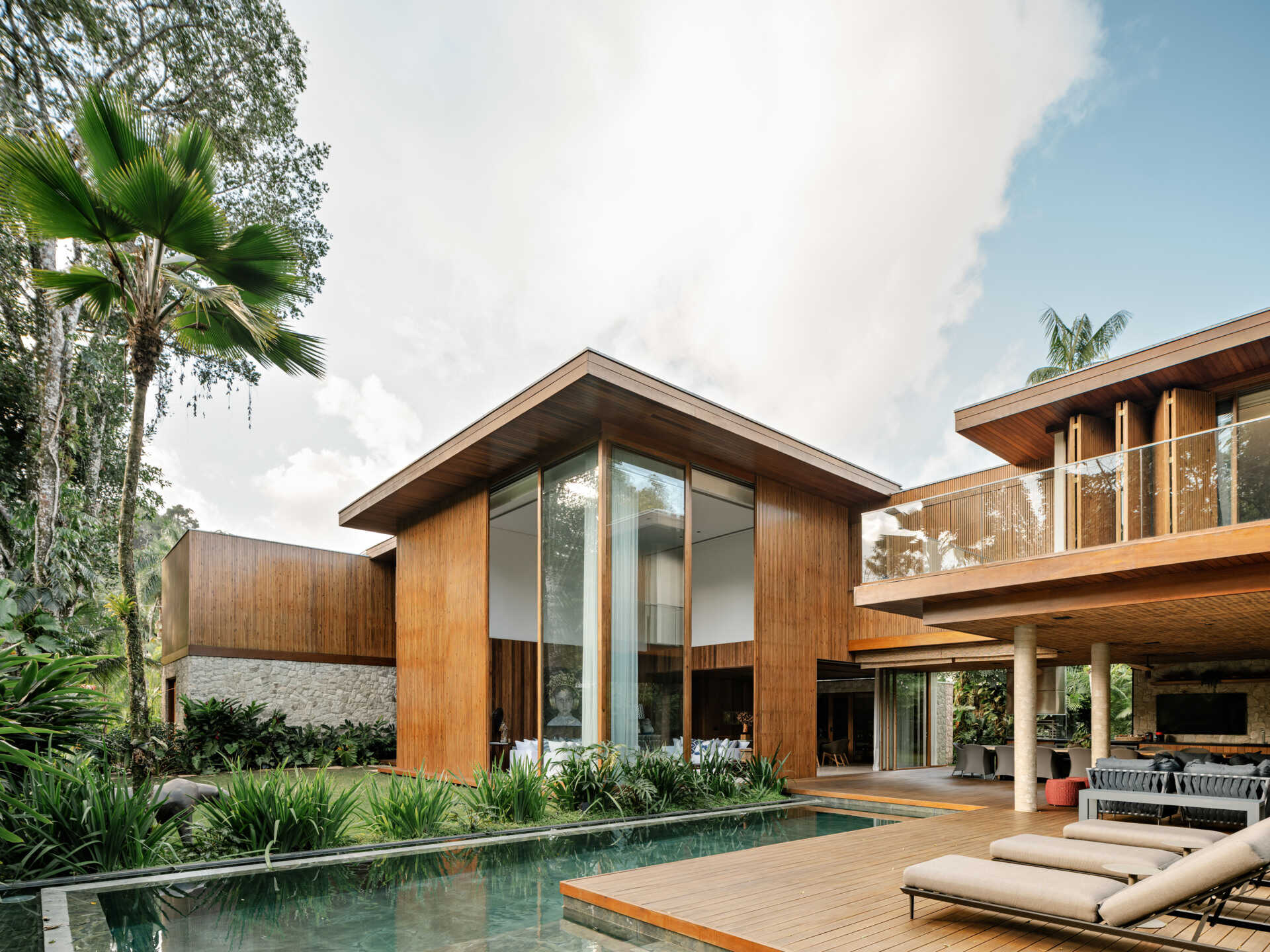 This green marble swimming pool and timber deck create one of the most beautiful outdoor spaces in the home.