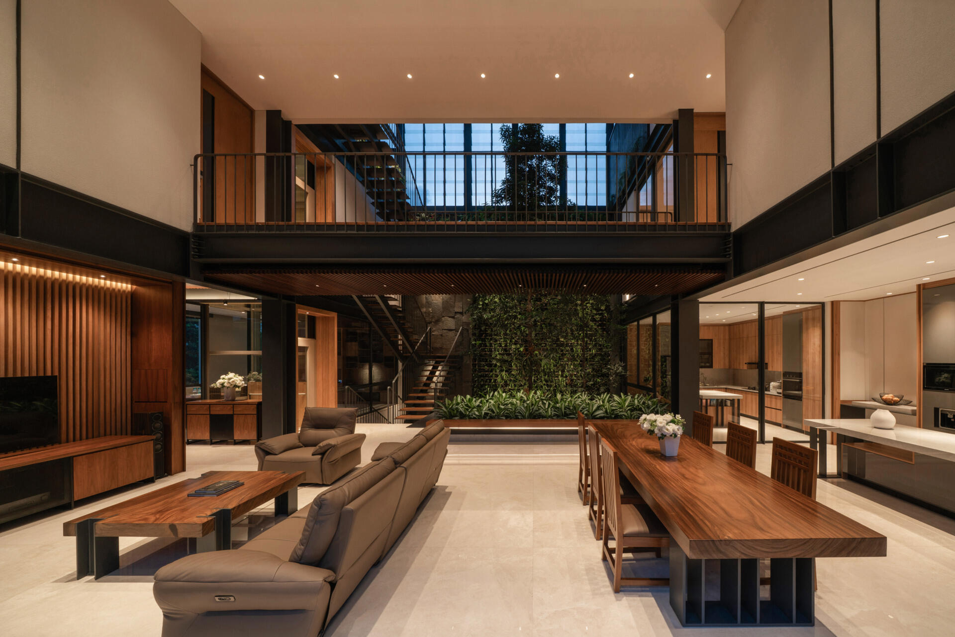 Discover an open-plan living space with park views, exposed steel, warm timber finishes and seamless indoor-outdoor connections.