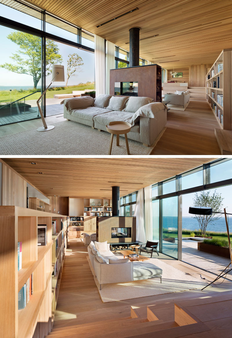 Step inside a modern living room where a 100-foot glass wall captures uninterrupted views across Peconic Bay.
