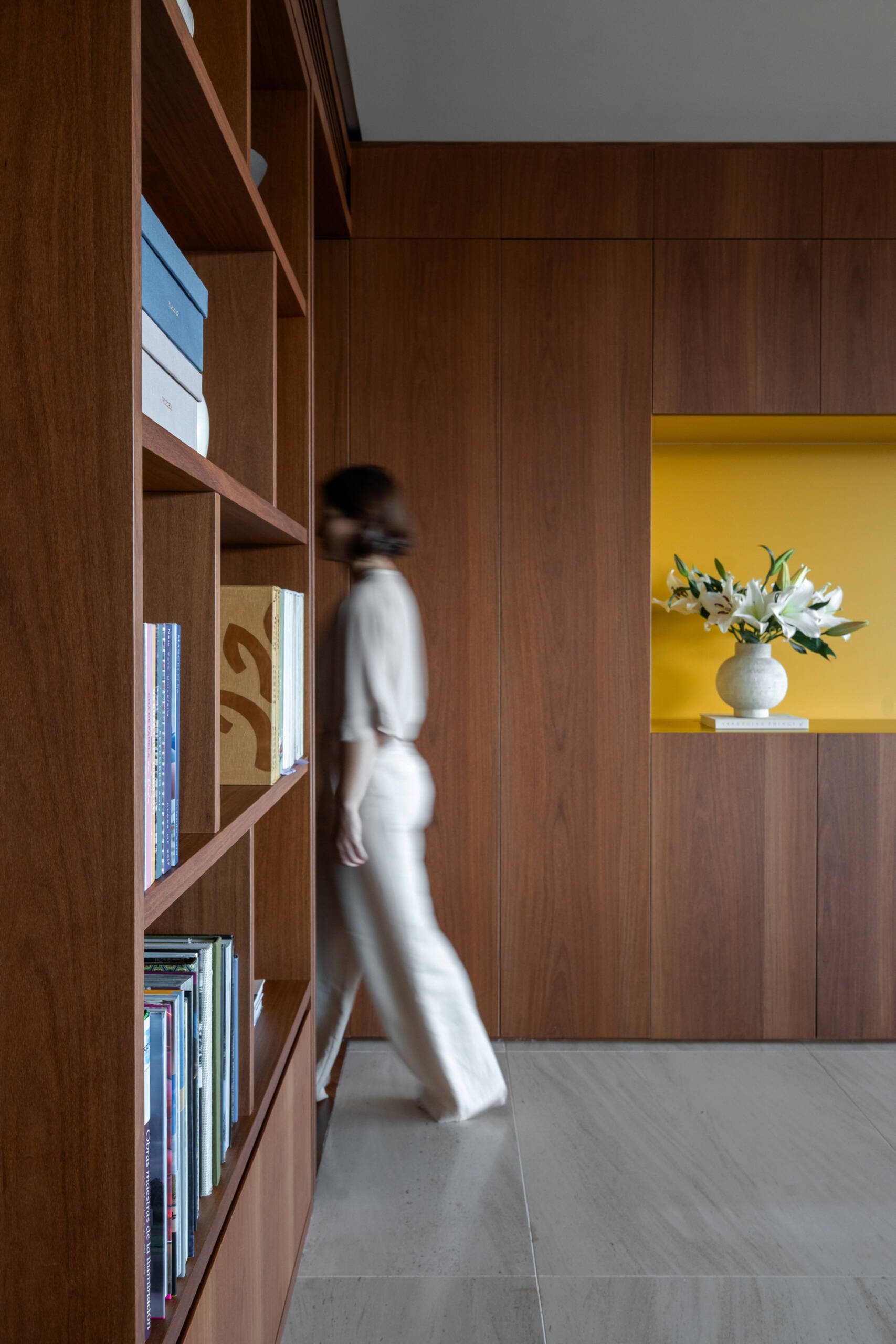 This media room combines a library, TV lounge and children's play area with beautifully integrated custom shelving.