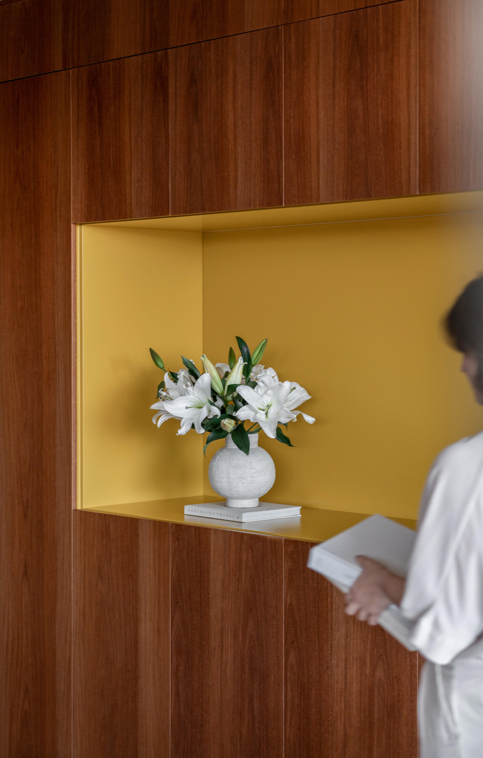 This media room combines a library, TV lounge and children's play area with beautifully integrated custom shelving.
