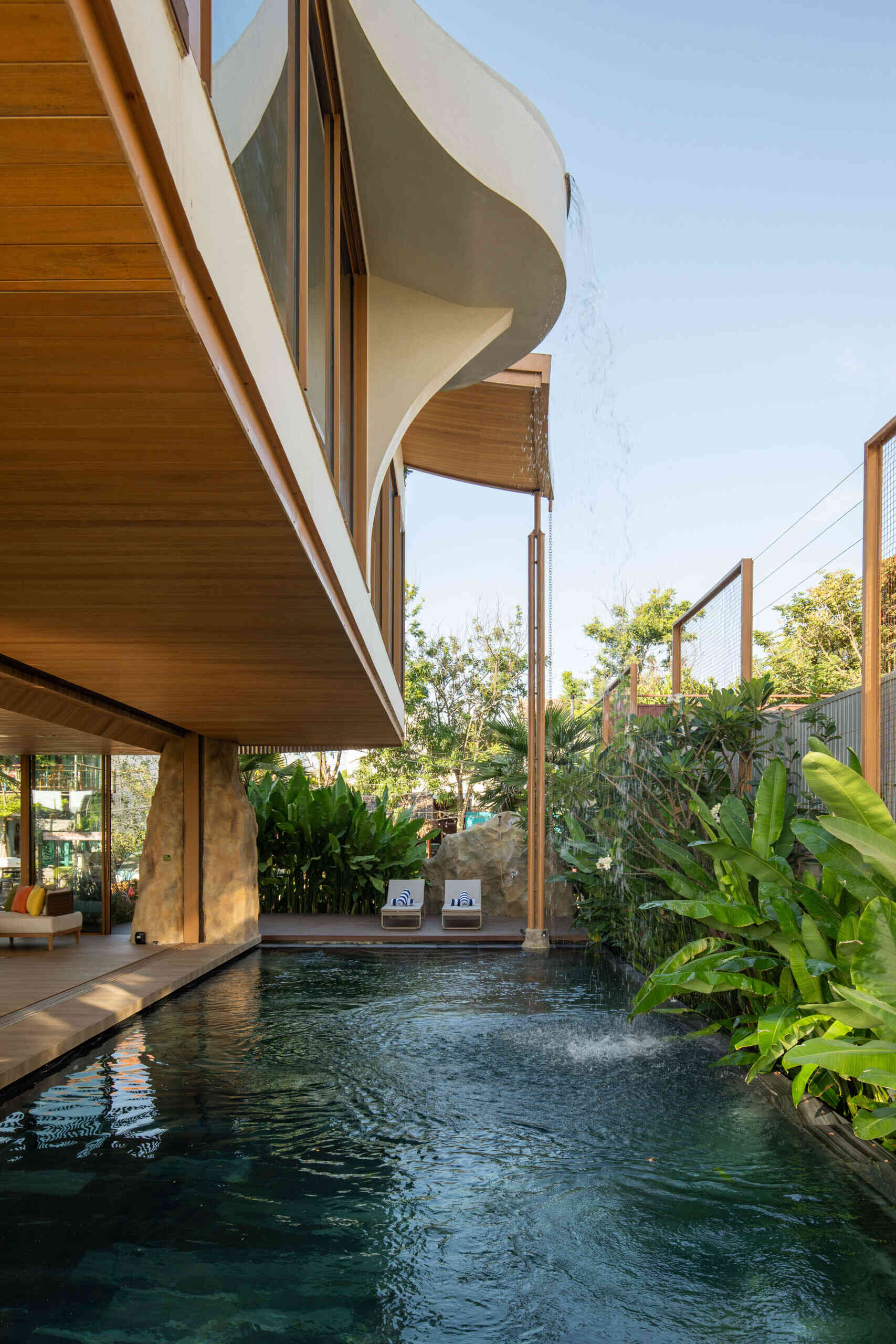 From the ground-floor swimming pool to the infinity pool above, water connects every level of TH Villa Hoi An with the surrounding landscape.