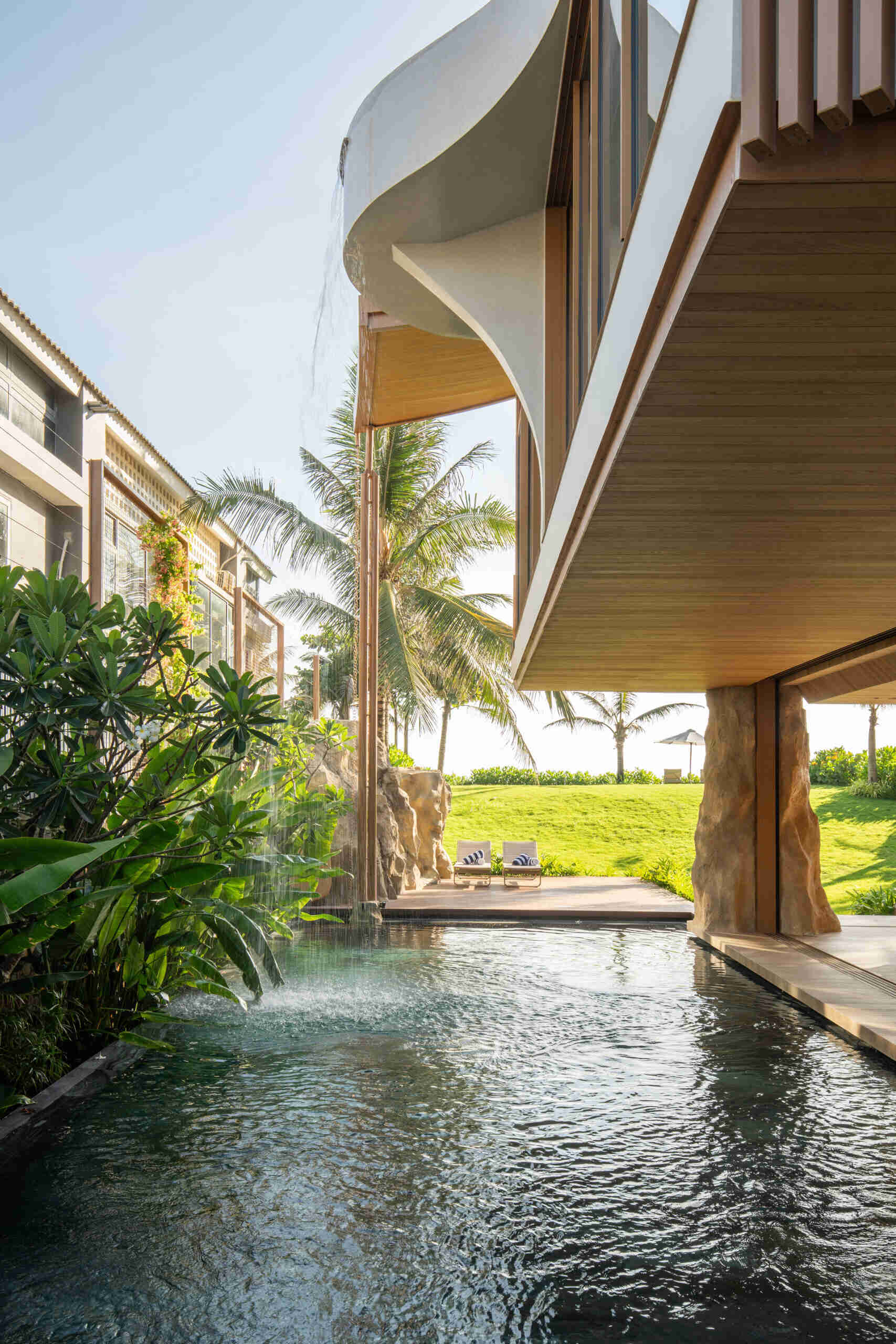 From the ground-floor swimming pool to the infinity pool above, water connects every level of TH Villa Hoi An with the surrounding landscape.