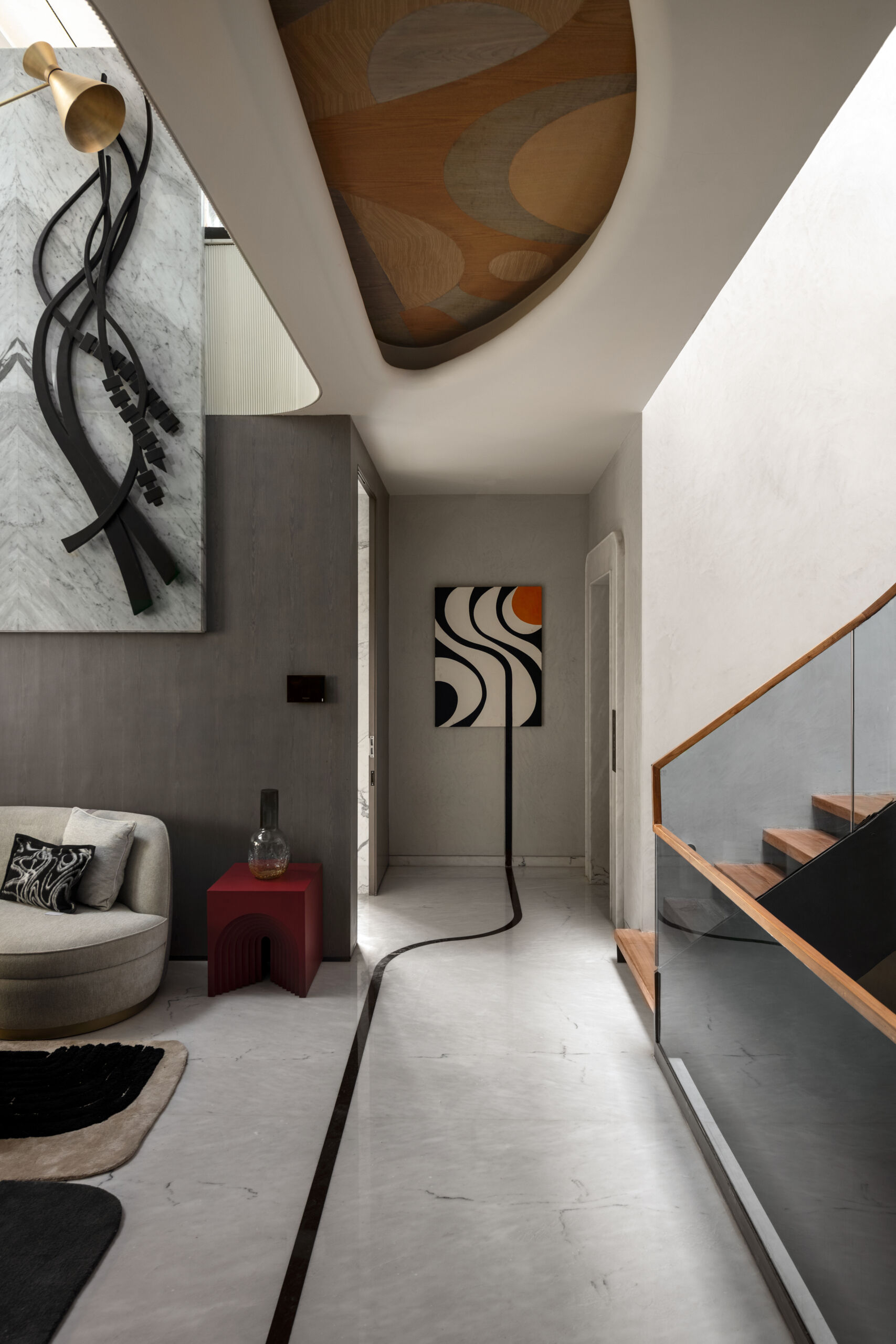 Gallery-inspired hallways filled with artwork, dramatic views and curved architecture make every transition memorable.