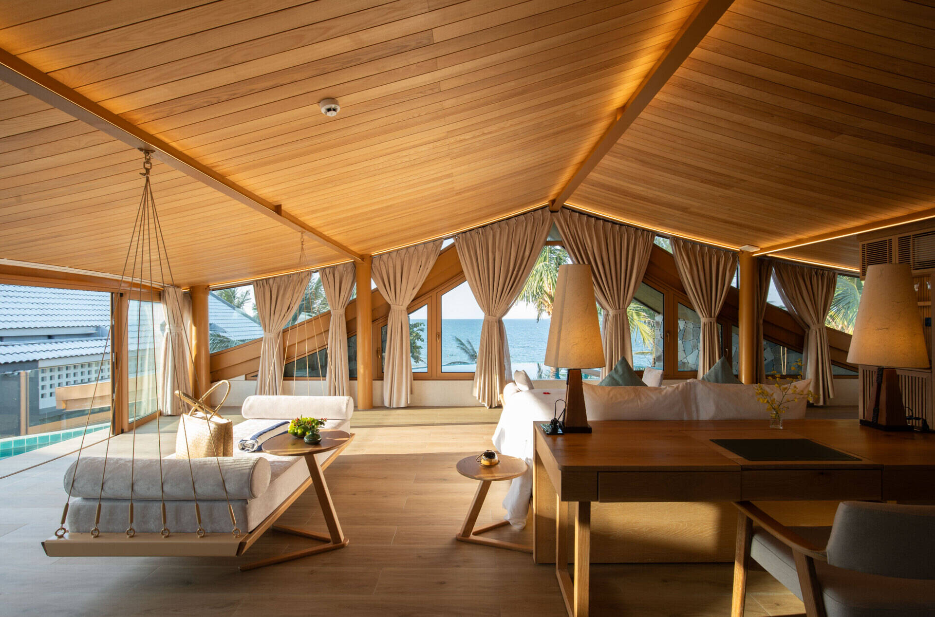 Perched beneath the soaring roof, the primary suite pairs panoramic sea views with its own infinity pool for an unforgettable coastal experience.