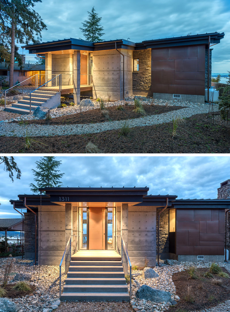 Take a tour of this one-room waterfront studio on Camano Island, where an open floor plan and a double-sided stone fireplace create a clever, space-saving layout.
