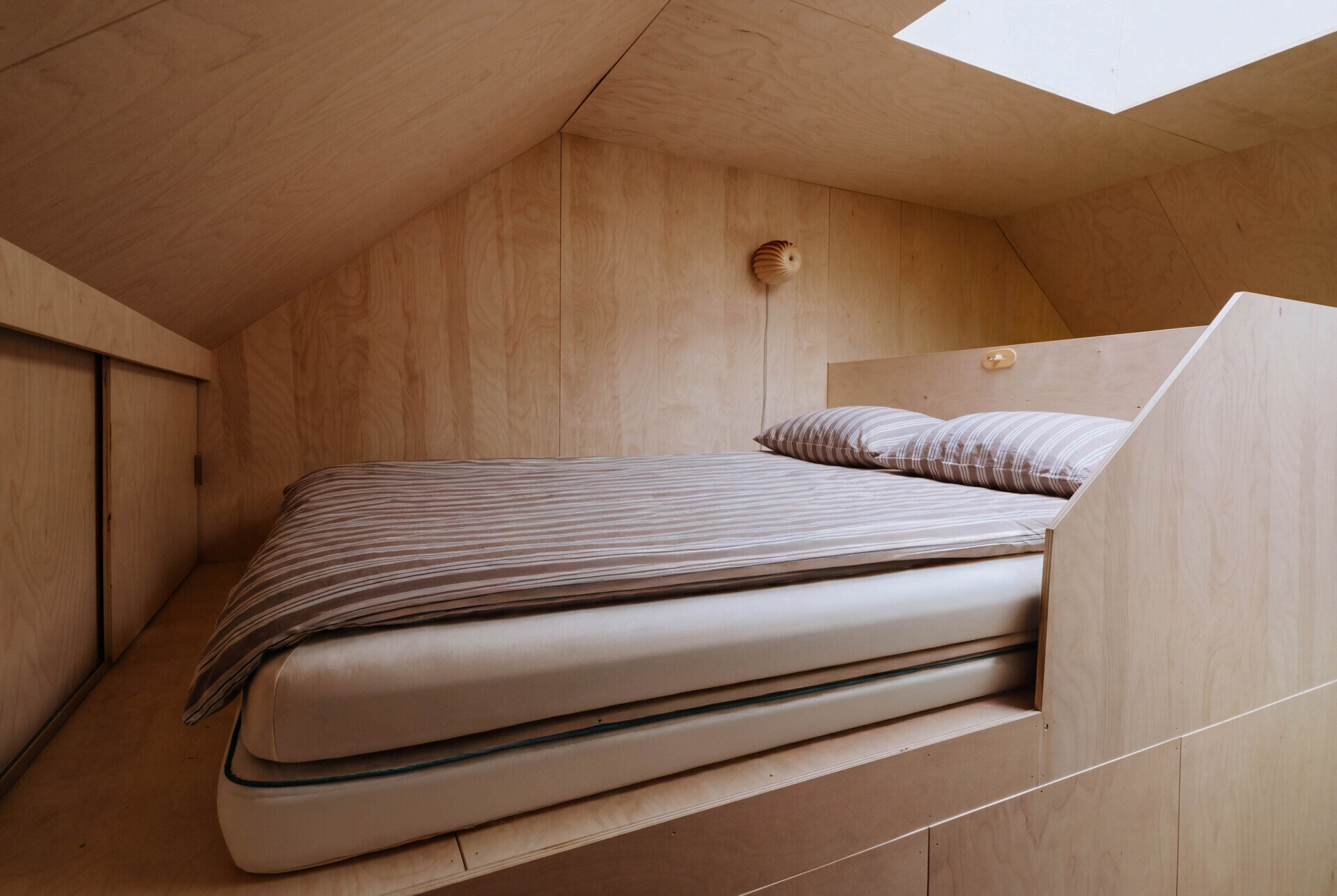 Sleeping mezzanines keep the floor plan open while providing comfortable accommodation for four guests.