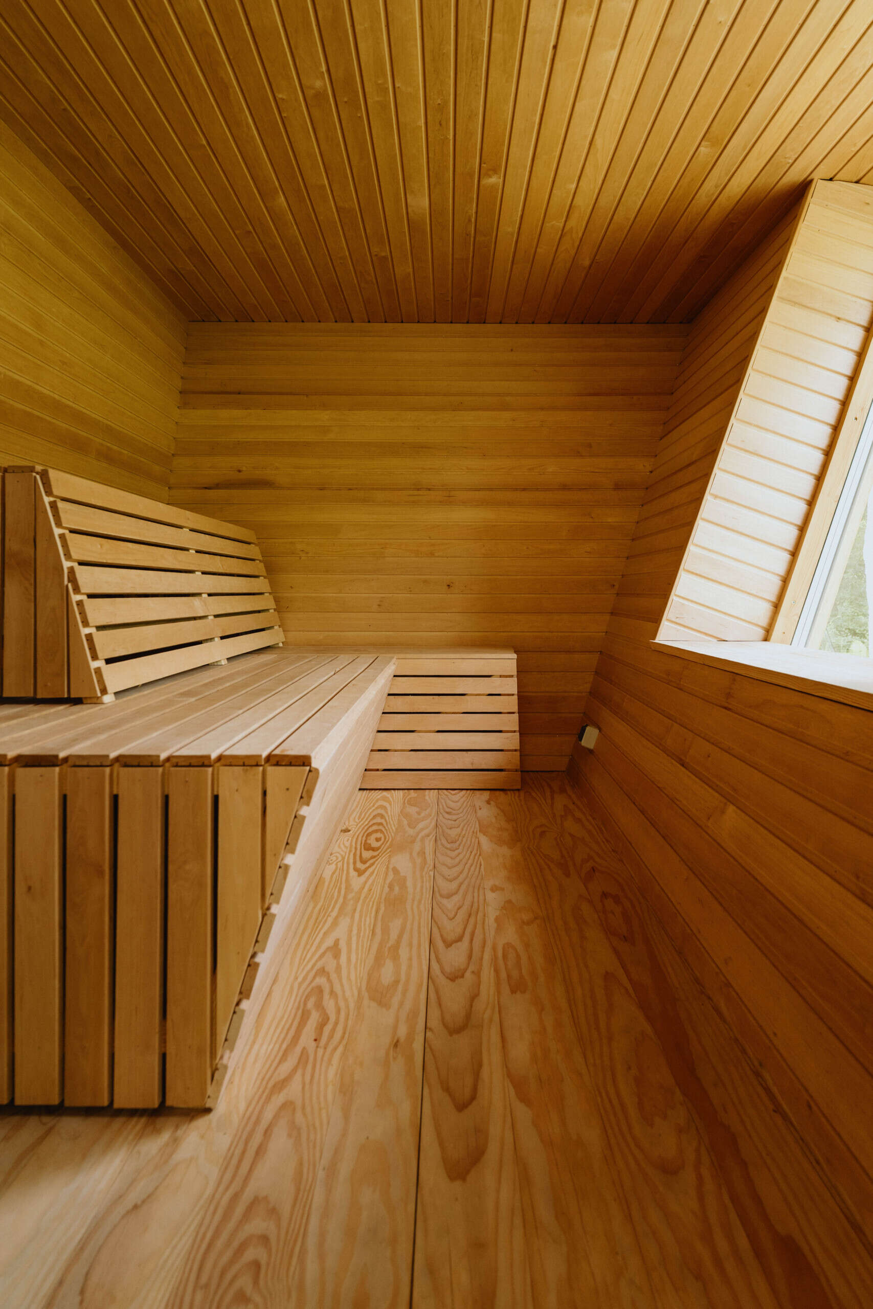 One of EcoNeo's standout features is an indoor sauna that seats eight and converts into extra sleeping space.