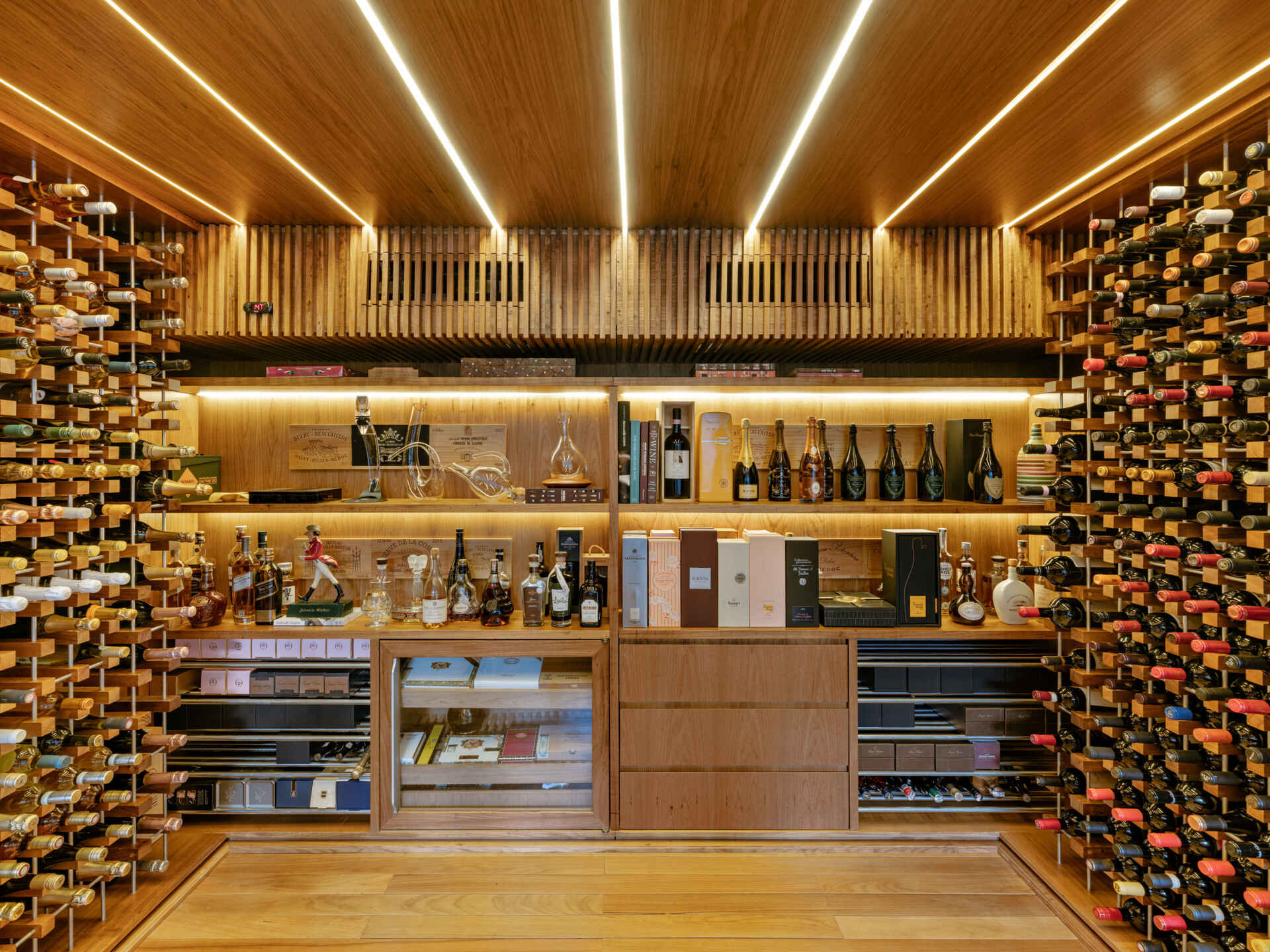 This stylish wine and cigar room adds another destination within the home's open entertaining spaces.