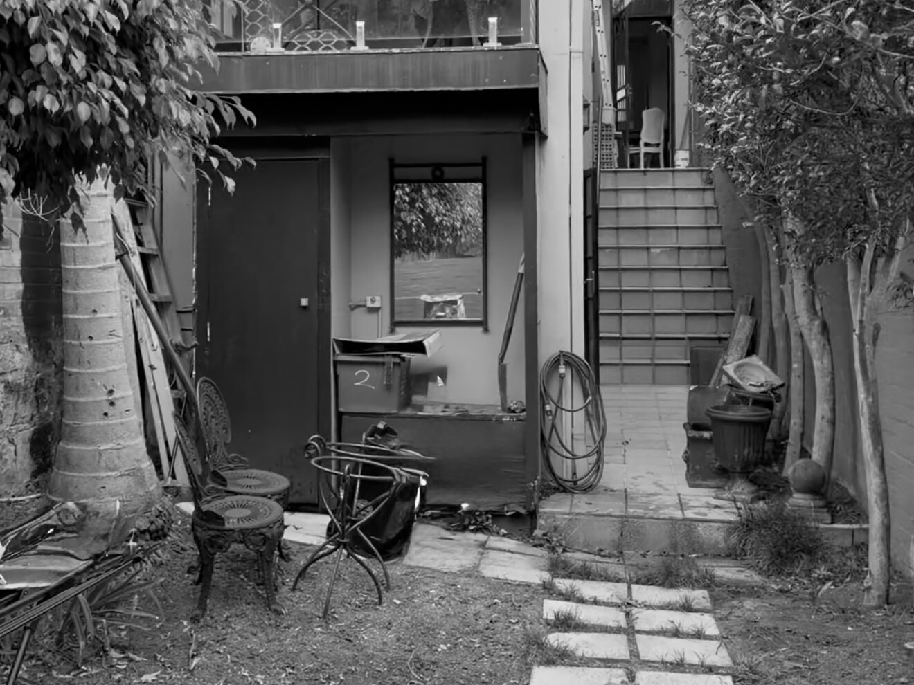 BEFORE - Discover how Noble Architecture transformed an awkward Sydney courtyard into a welcoming outdoor space with a completely reimagined layout.