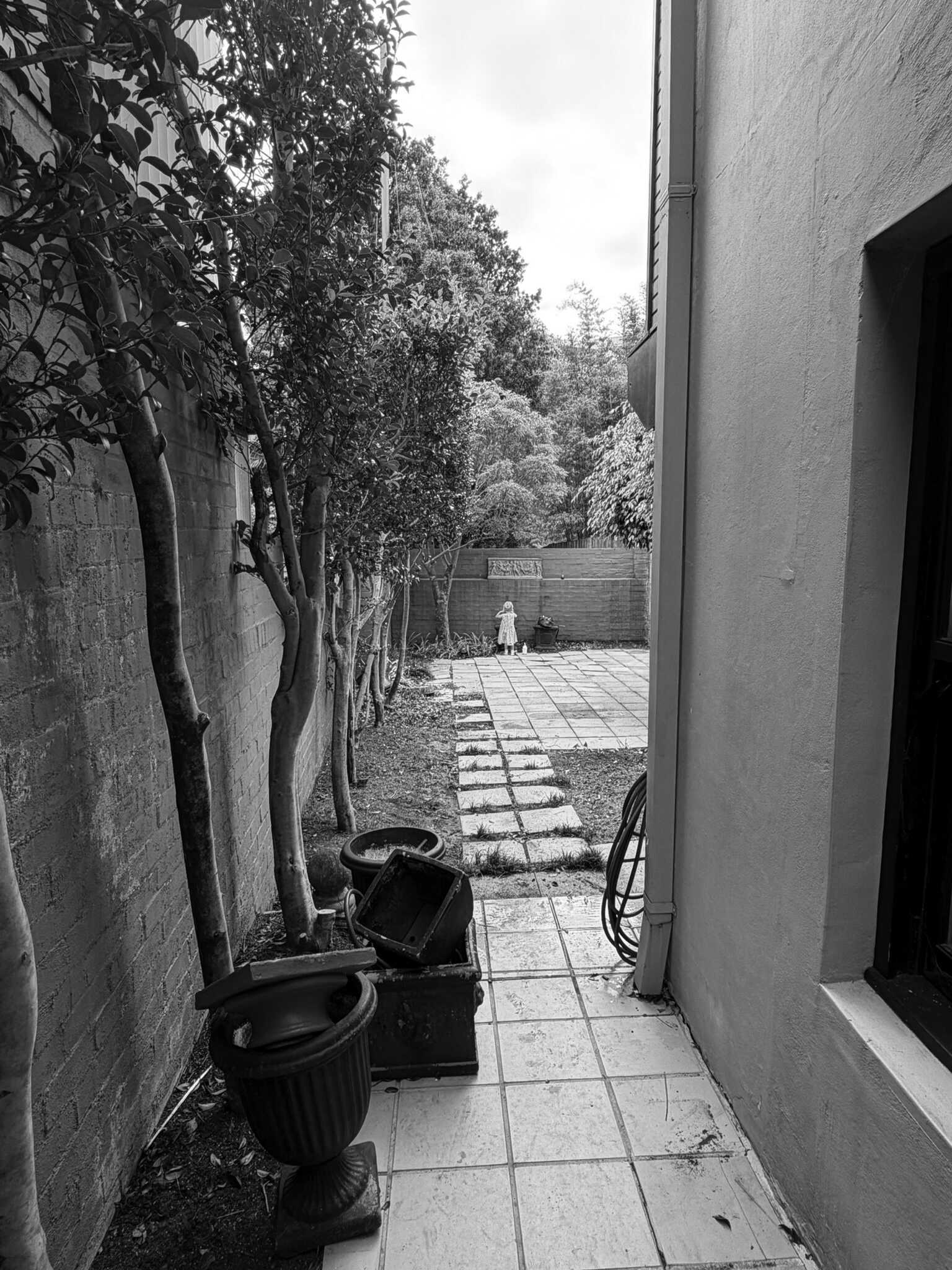 BEFORE - Discover how Noble Architecture transformed an awkward Sydney courtyard into a welcoming outdoor space with a completely reimagined layout.