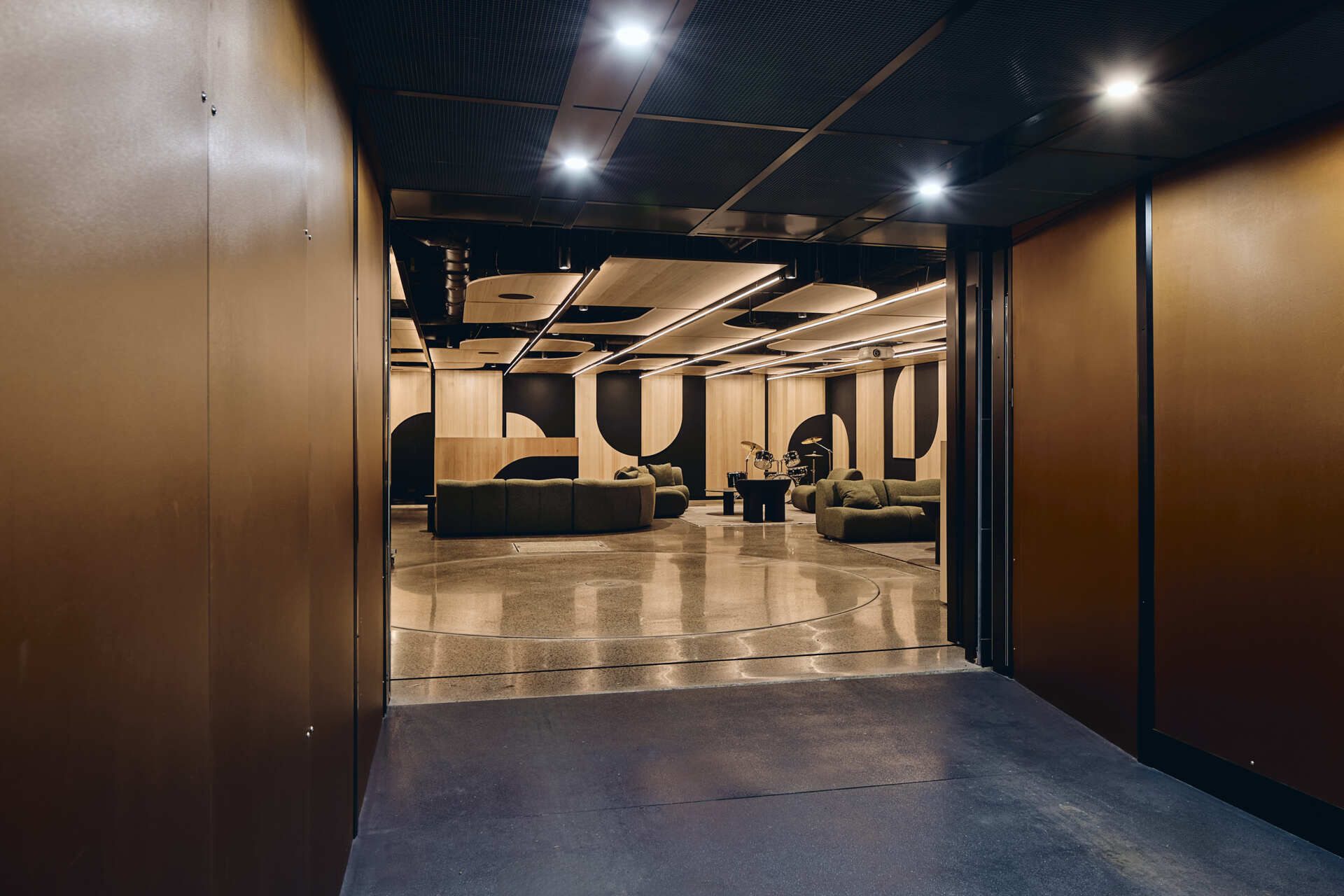 Below the garden, Babylonia's entertaining level includes a kitchen, bar, dining area and relaxed lounge