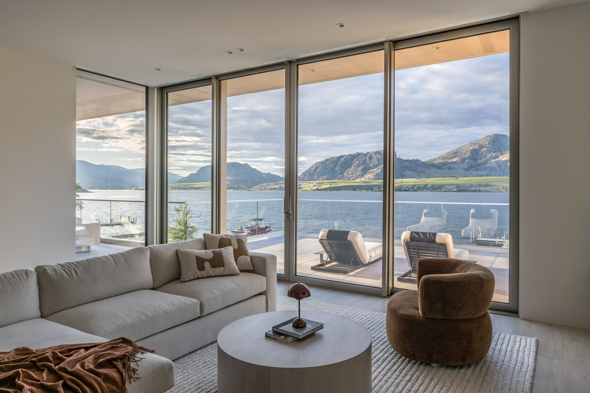 Explore the upstairs lounge and adjoining terrace at Desert Lake House, where the elevated position creates a different perspective across Osoyoos Lake.