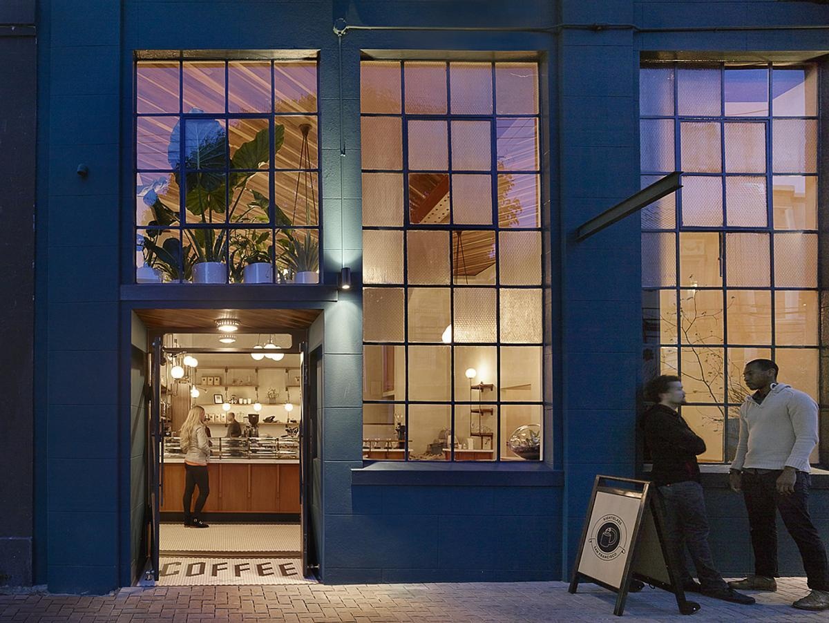 A bold blue exterior, subtle architectural details, and a welcoming entrance give Sightglass Coffee an identity that's easy to spot on a San Francisco street.