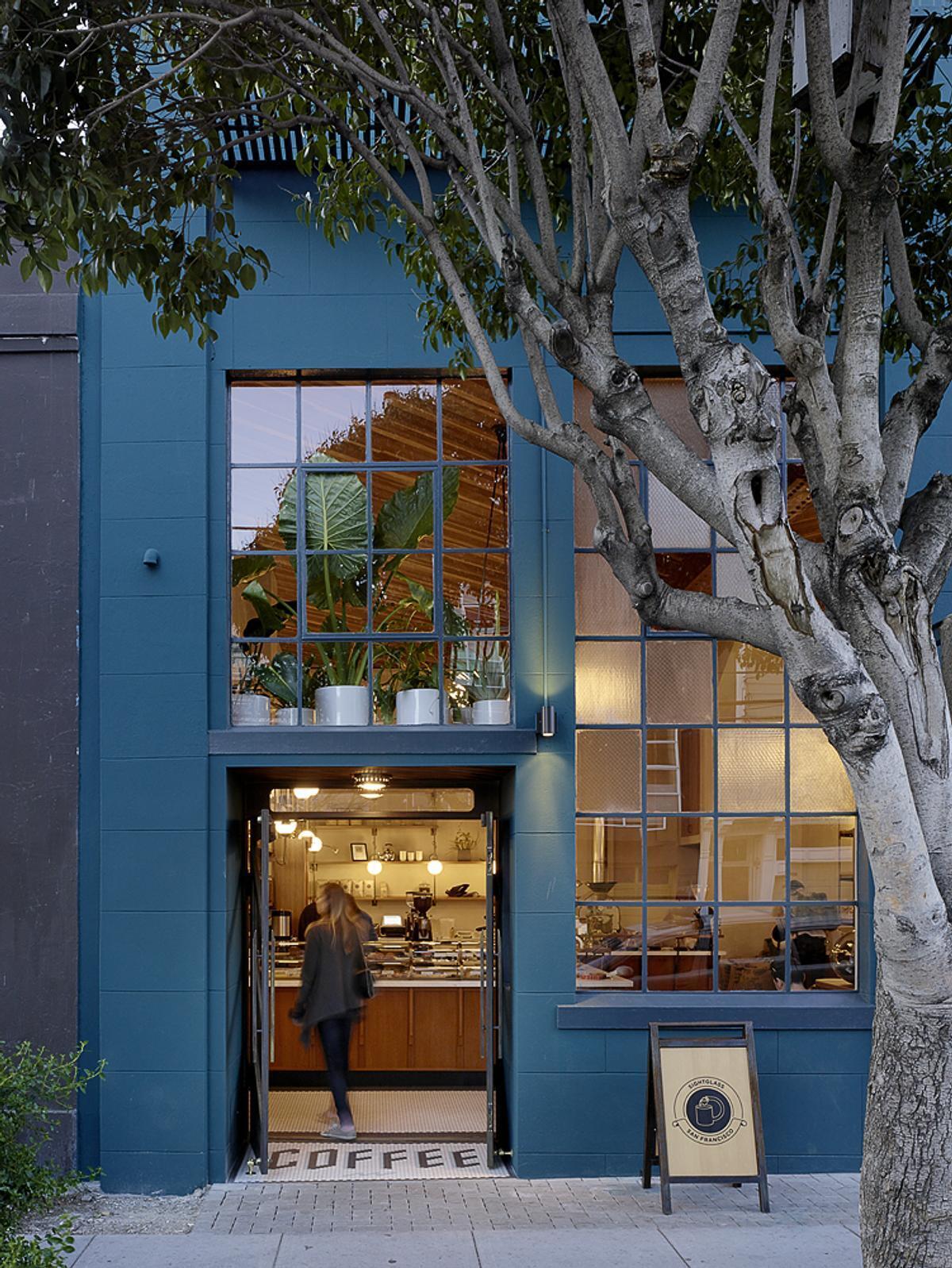 A bold blue exterior, subtle architectural details, and a welcoming entrance give Sightglass Coffee an identity that's easy to spot on a San Francisco street.