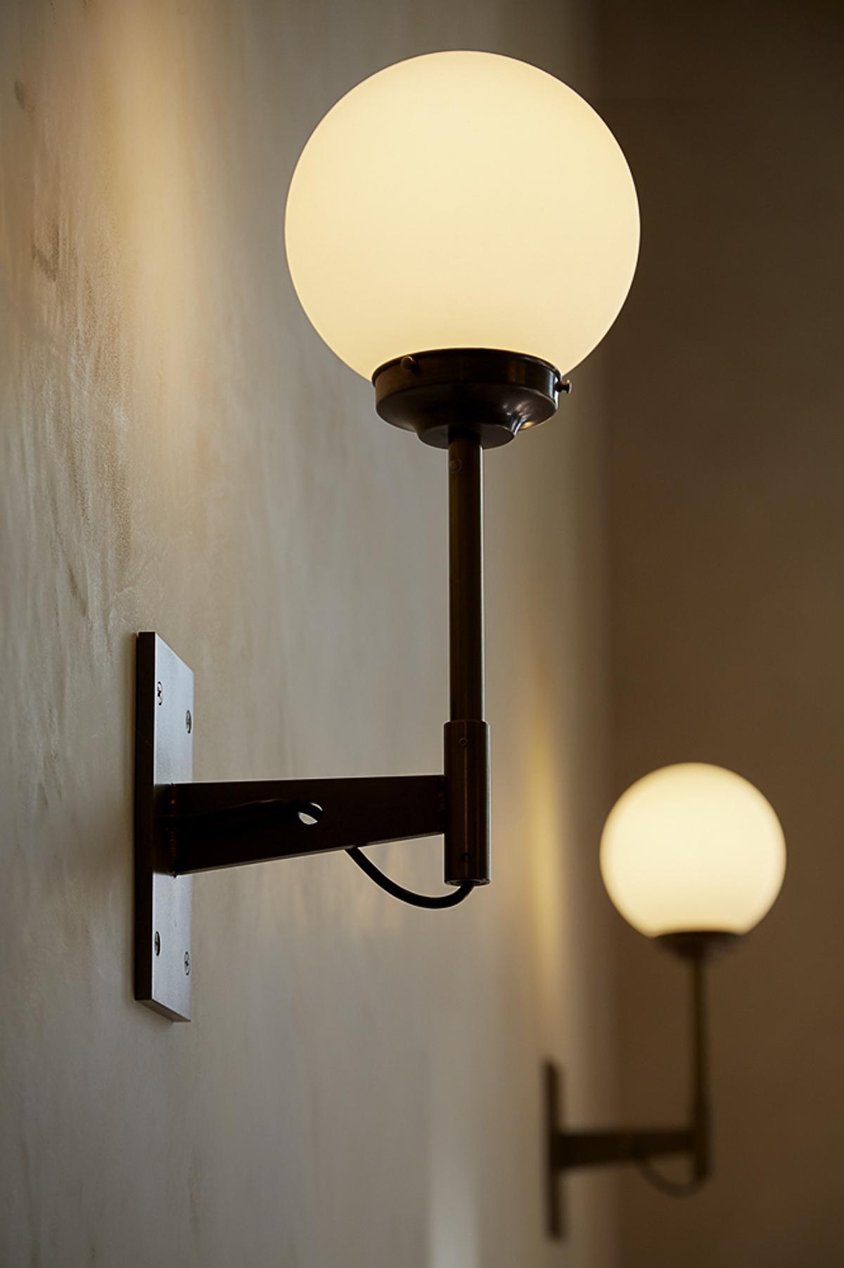 From brass hardware and handcrafted fixtures to custom woodwork and patterned tiles, every detail adds another layer to the café's design.