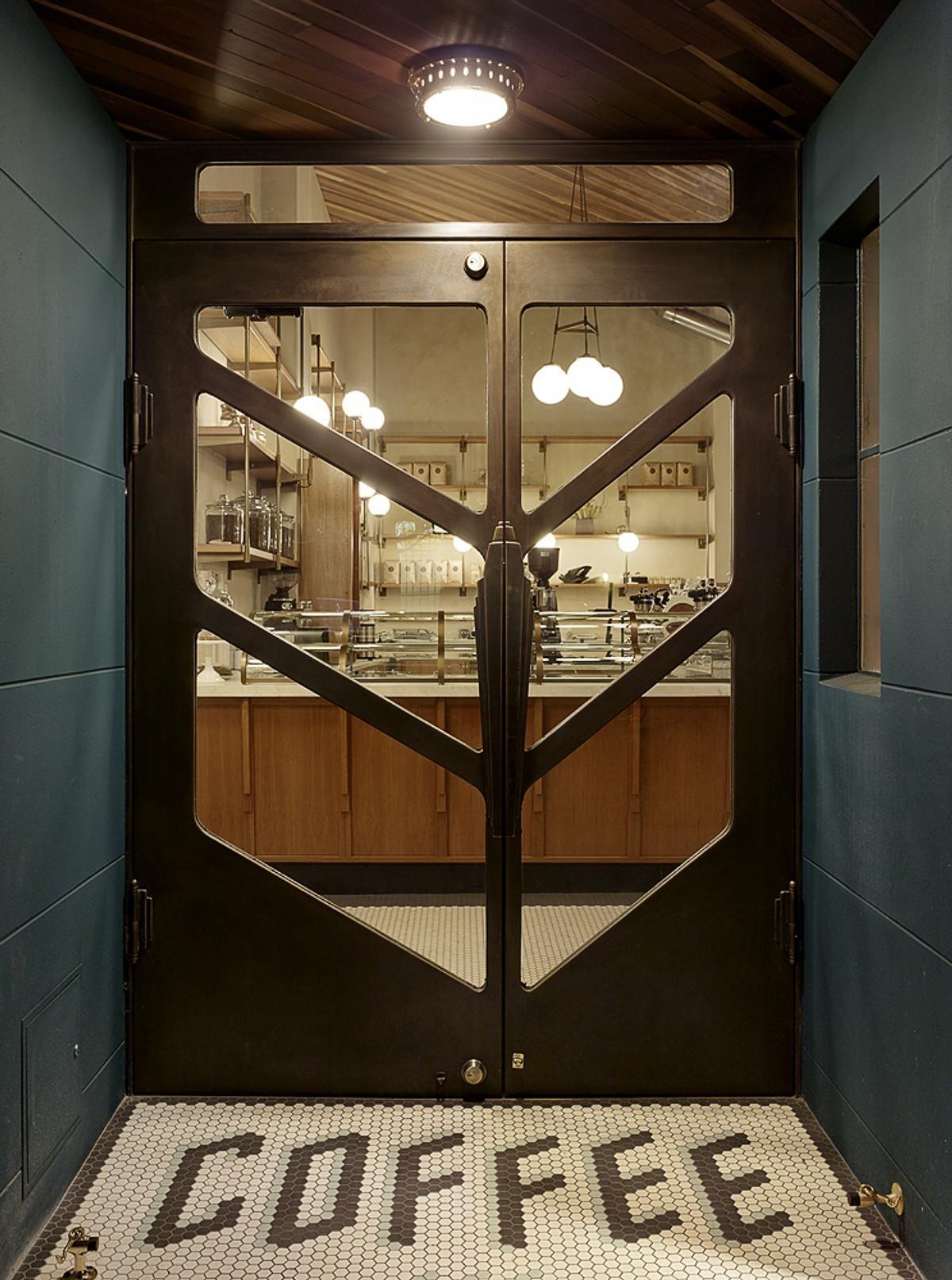 A bold blue exterior, subtle architectural details, and a welcoming entrance give Sightglass Coffee an identity that's easy to spot on a San Francisco street.