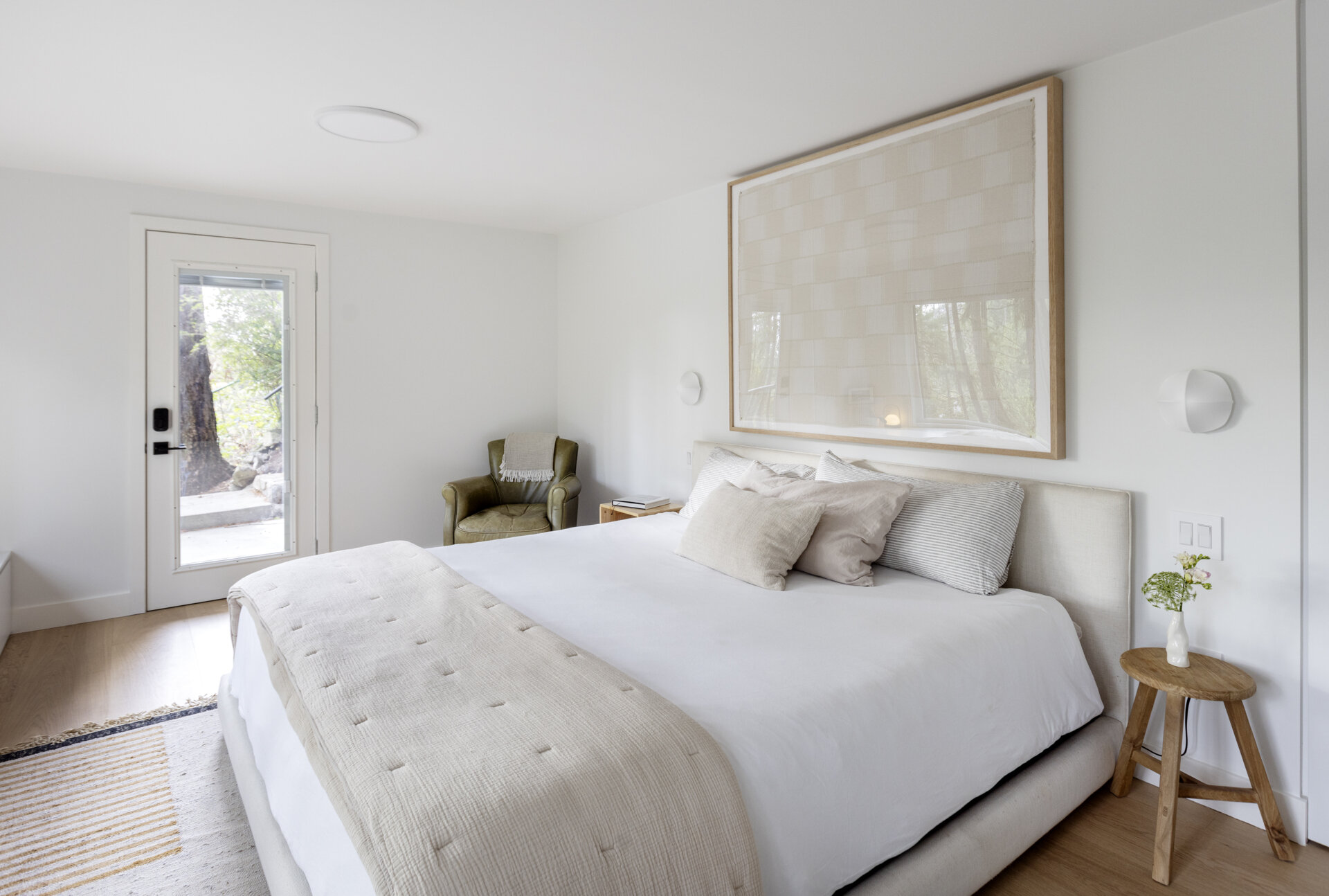 Explore the private guest suite at Westport Place House, complete with a new bathroom, forest views, earthy finishes and a wood-burning fireplace for extra warmth and comfort.