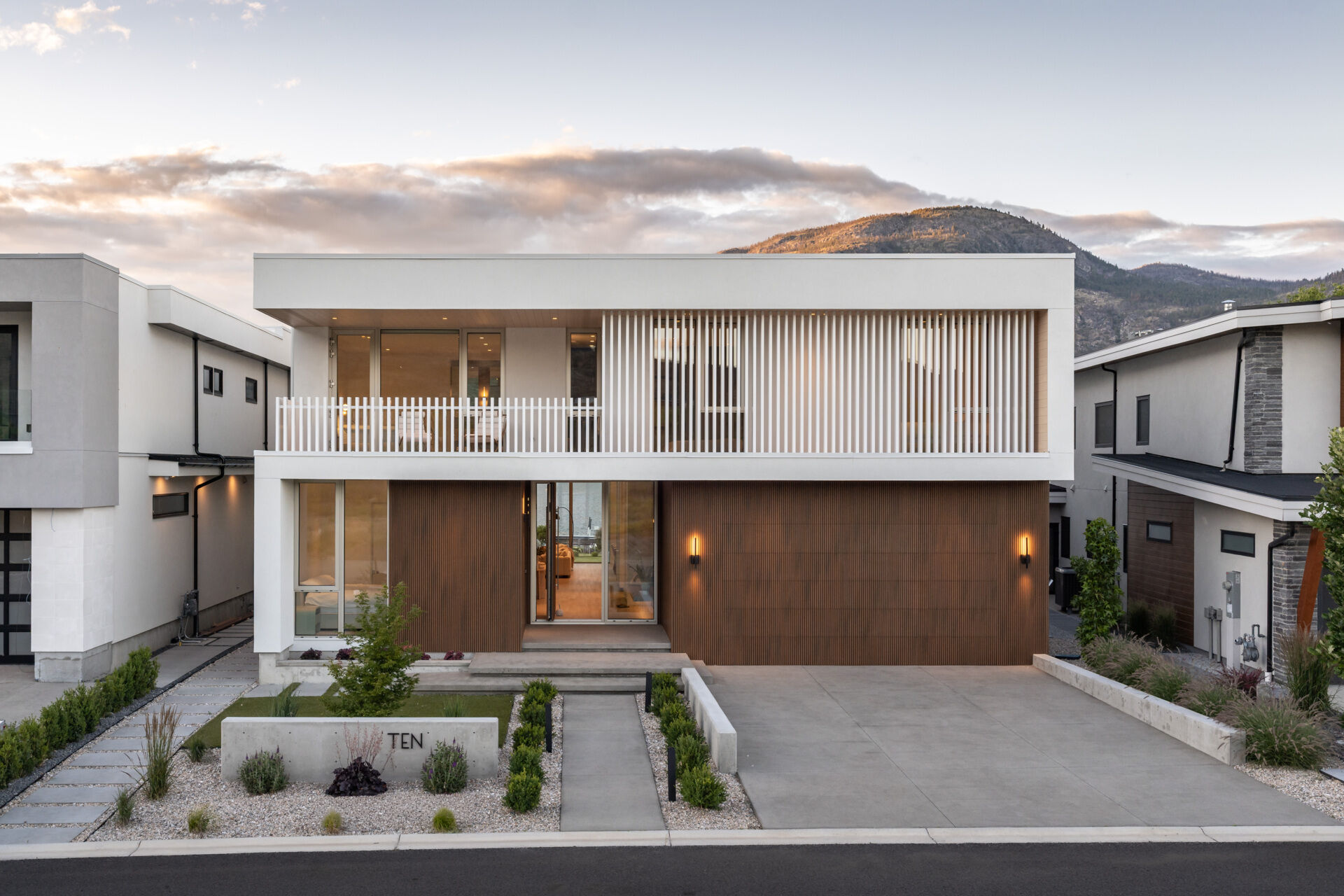 Desert Lake House by BLA Design Group sits on the shores of Osoyoos Lake, using layered volumes, sheltered spaces and lake views to shape its interiors.