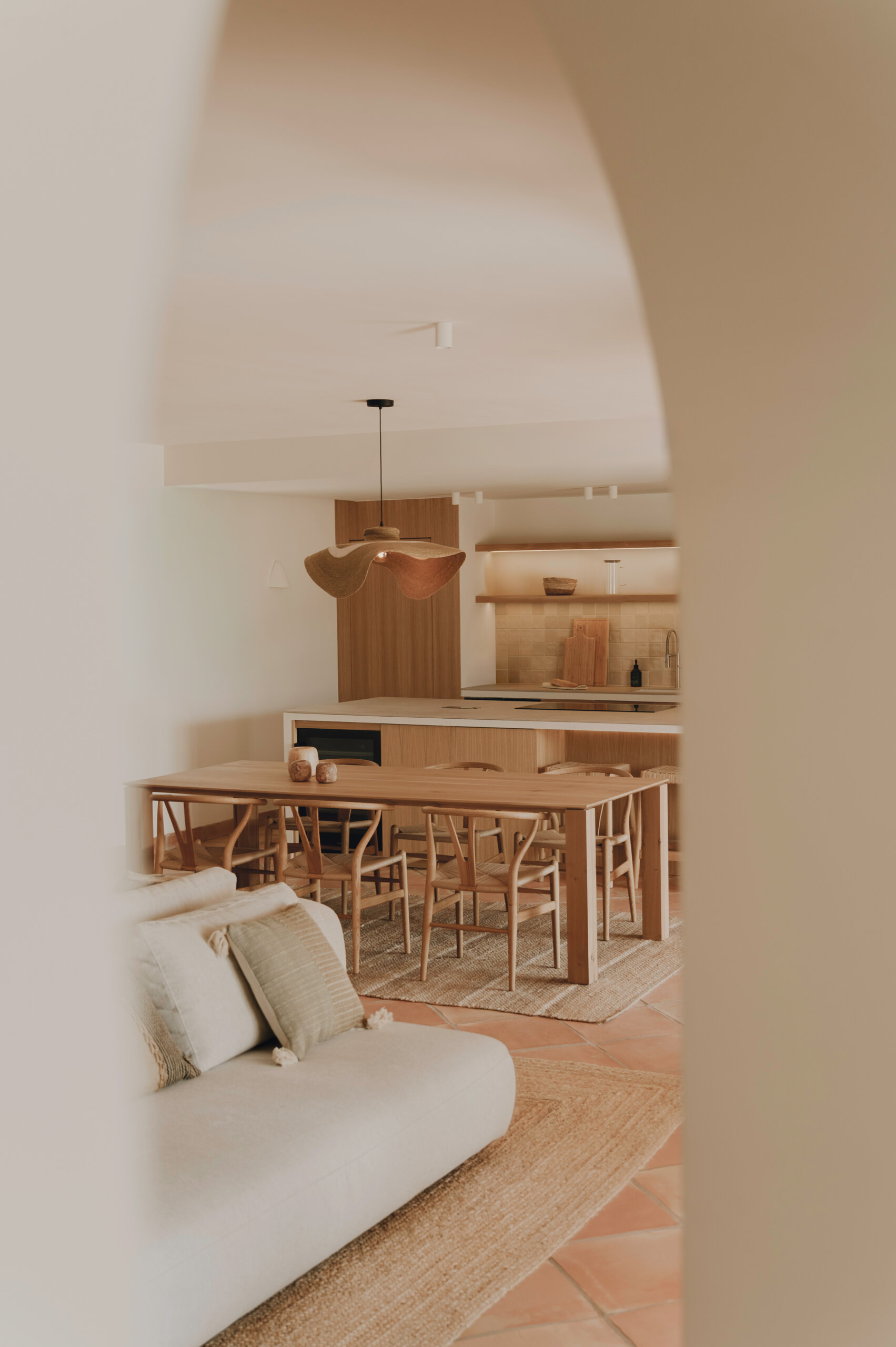 This Mediterranean kitchen pairs custom oak cabinetry with a handcrafted dining space centred around a beautiful solid oak table.