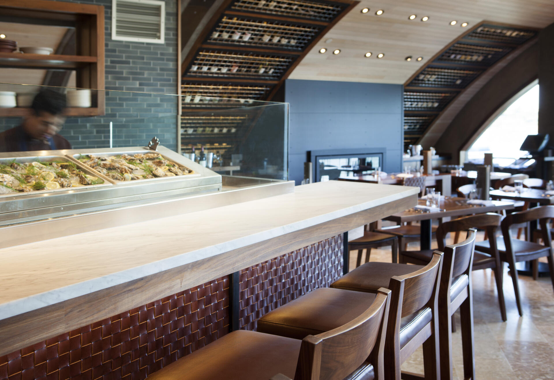 See how a former Sausalito ferry terminal was transformed into Barrel House Tavern while retaining historic features including expansive windows, cement plaster arches, and a reclaimed maple ceiling.