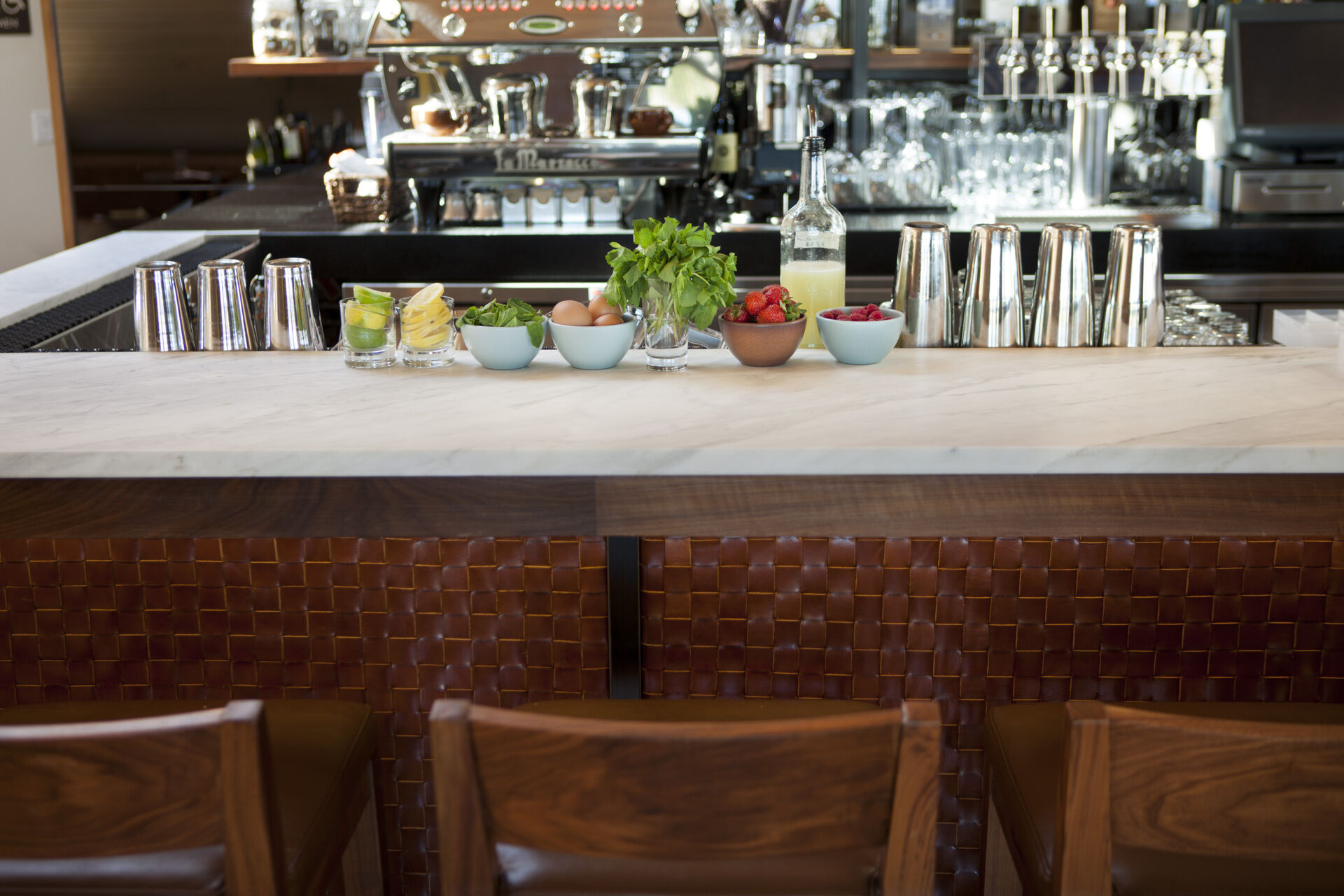See how a former Sausalito ferry terminal was transformed into Barrel House Tavern while retaining historic features including expansive windows, cement plaster arches, and a reclaimed maple ceiling.