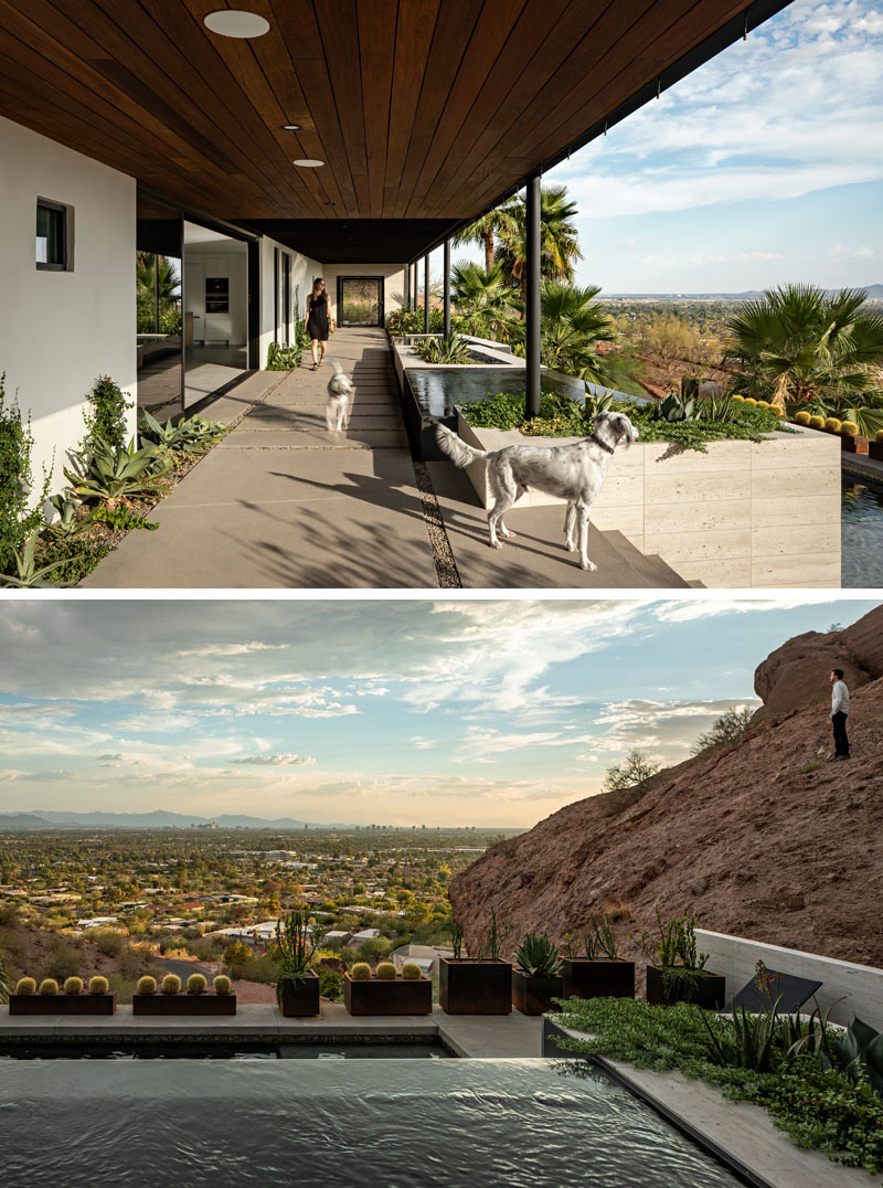 This Phoenix home's covered patio uses misters to stay comfortable in the desert heat and opens toward a hot tub with expansive views of Camelback Mountain and the surrounding desert.