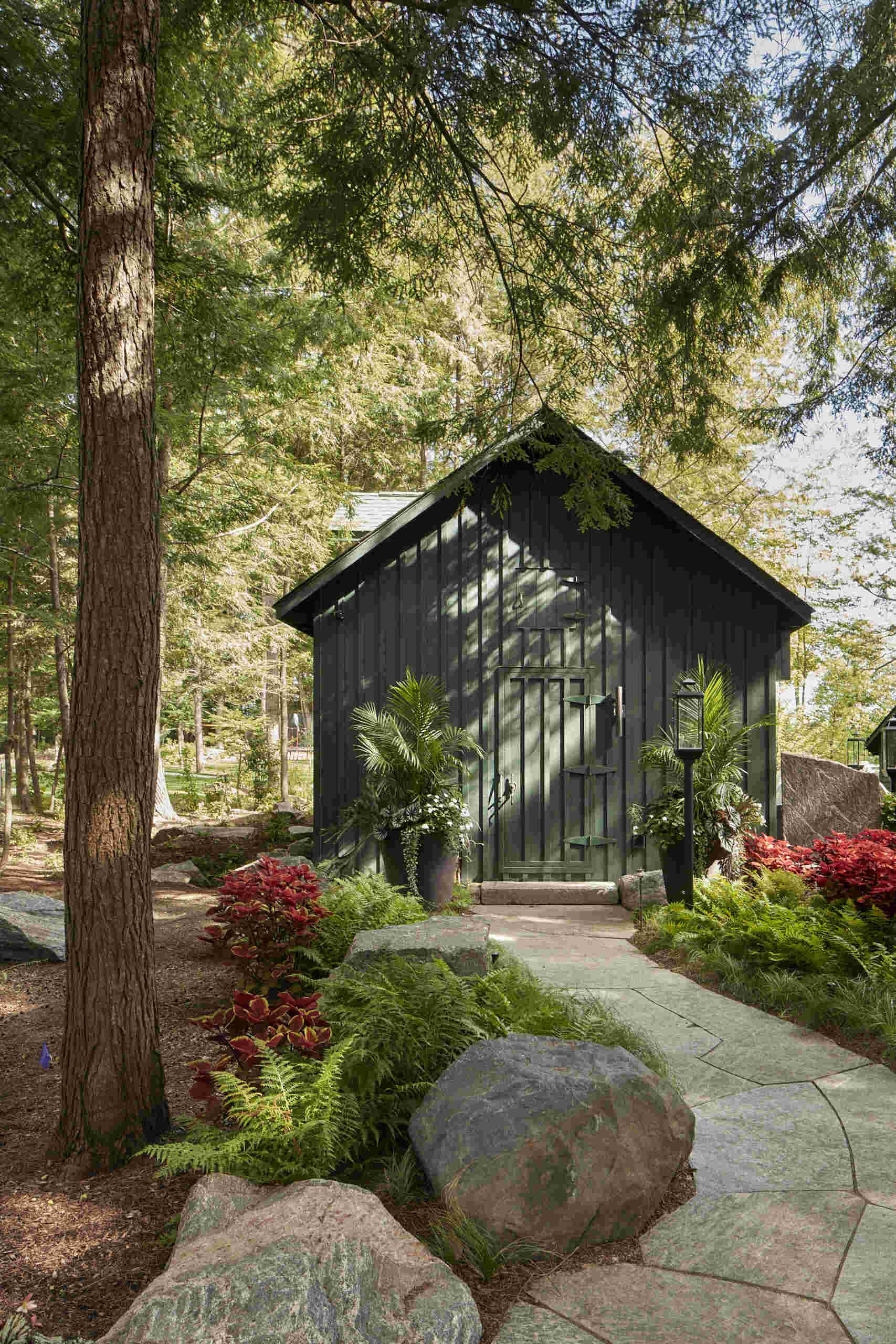 PARTISANS transformed a modest ice-storage hut on a Muskoka island into a compact thermal spa filled with carved Canadian Shield granite, custom-milled cedar, a sauna, cold plunge and steam room, as well as an outdoor patio with outdoor shower.