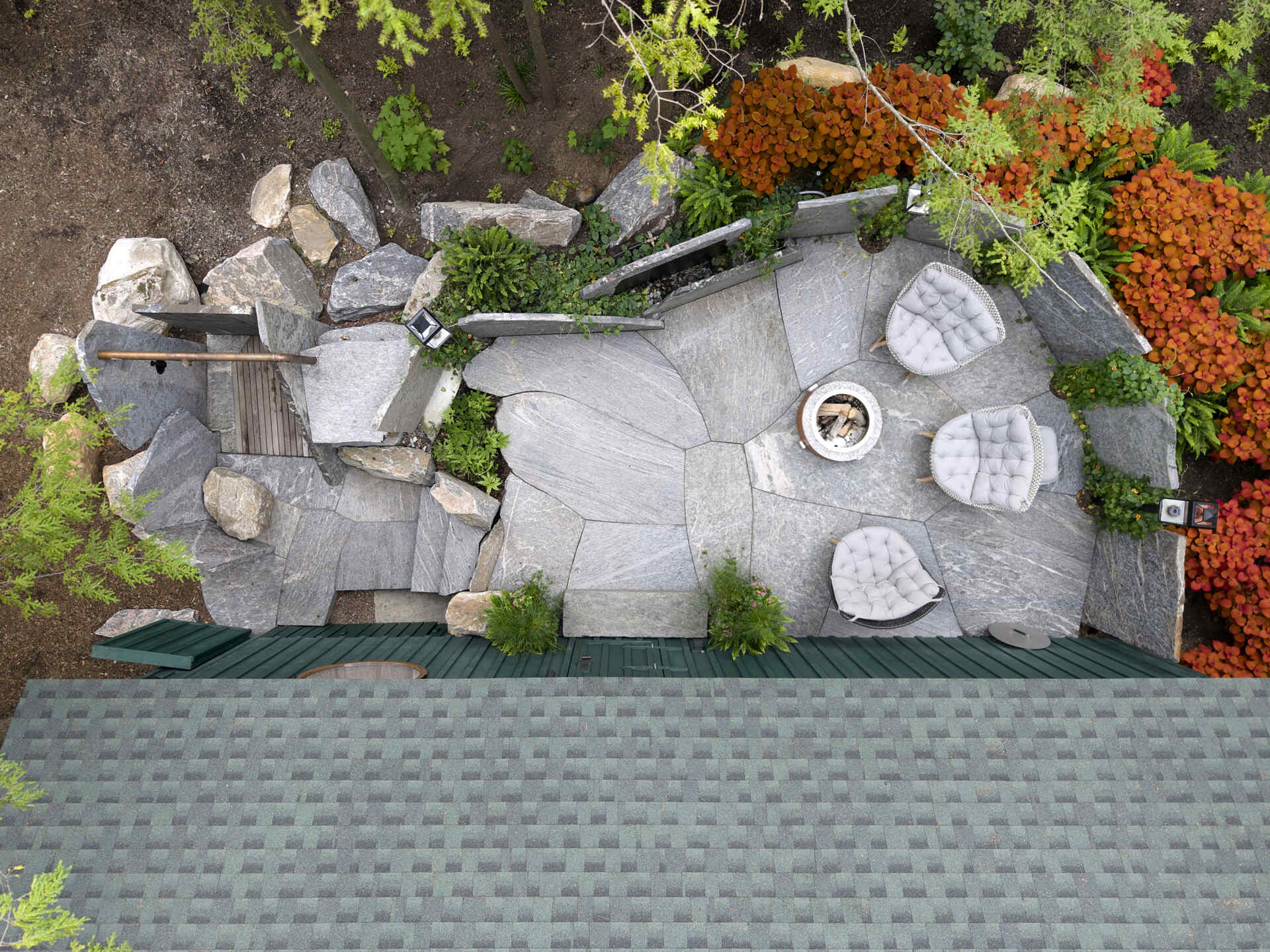PARTISANS transformed a modest ice-storage hut on a Muskoka island into a compact thermal spa filled with carved Canadian Shield granite, custom-milled cedar, a sauna, cold plunge and steam room, as well as an outdoor patio with outdoor shower.