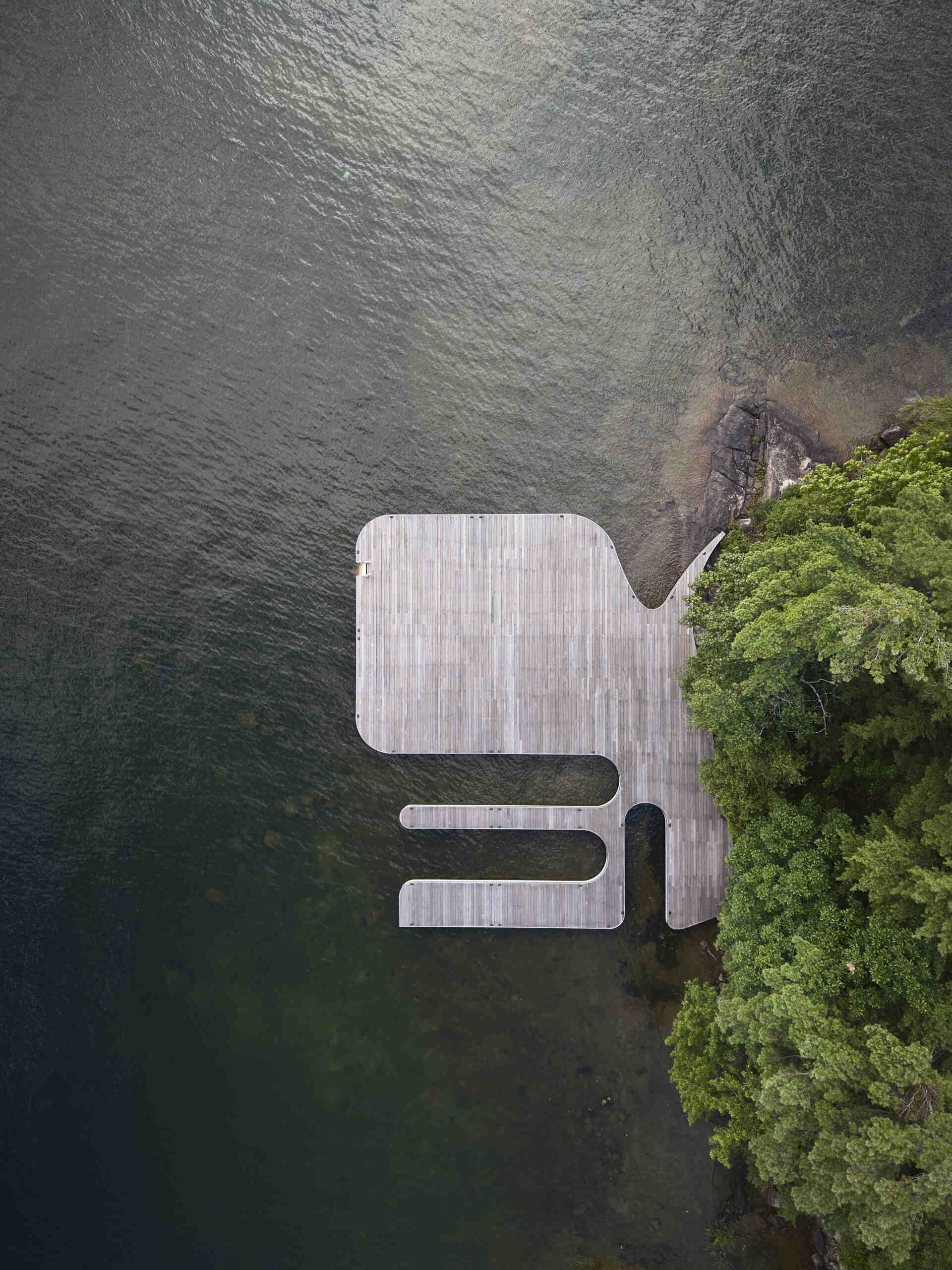 PARTISANS transformed a modest ice-storage hut on a Muskoka island into a compact thermal spa filled with carved Canadian Shield granite, custom-milled cedar, a sauna, cold plunge and steam room, as well as an outdoor patio with outdoor shower.
